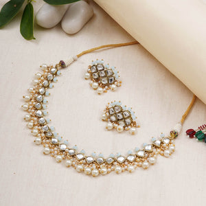 Kundan choker set in gold-tone with matching earrings and long bridal necklace, perfect for wedding functions , festive and bridal wear
