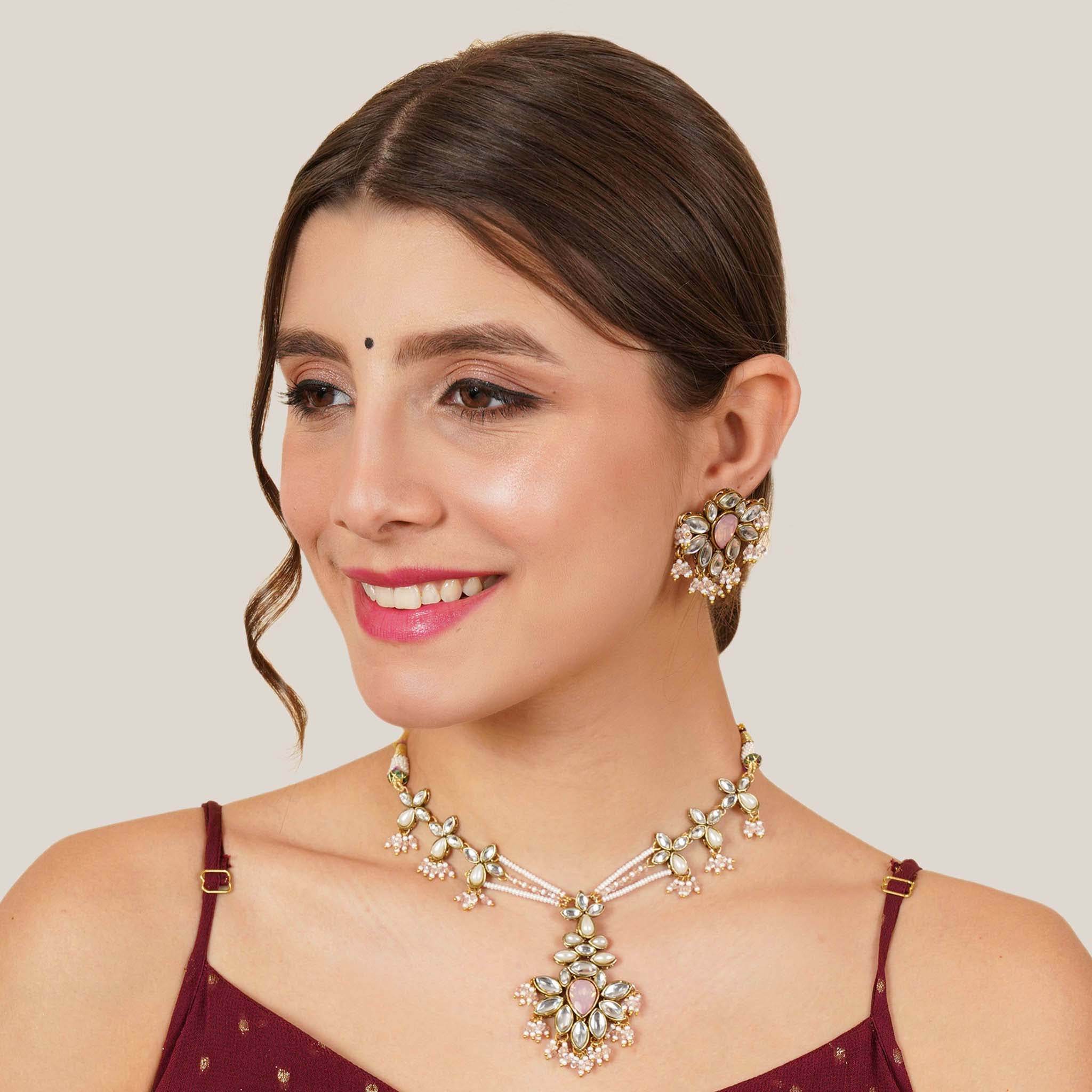 Kundan choker set in gold-tone with matching earrings and long bridal necklace, perfect for wedding functions , festive and bridal wear