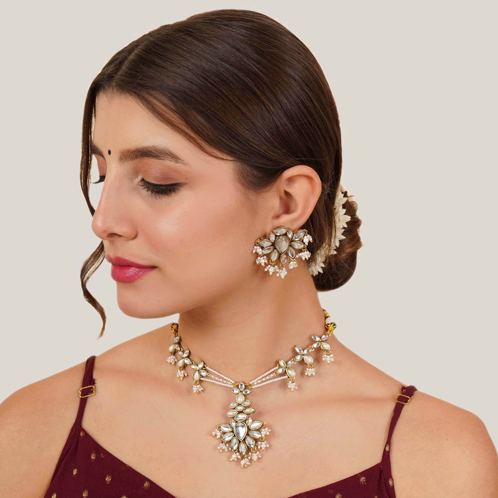 Kundan choker set in gold-tone with matching earrings and long bridal necklace, perfect for wedding functions , festive and bridal wear