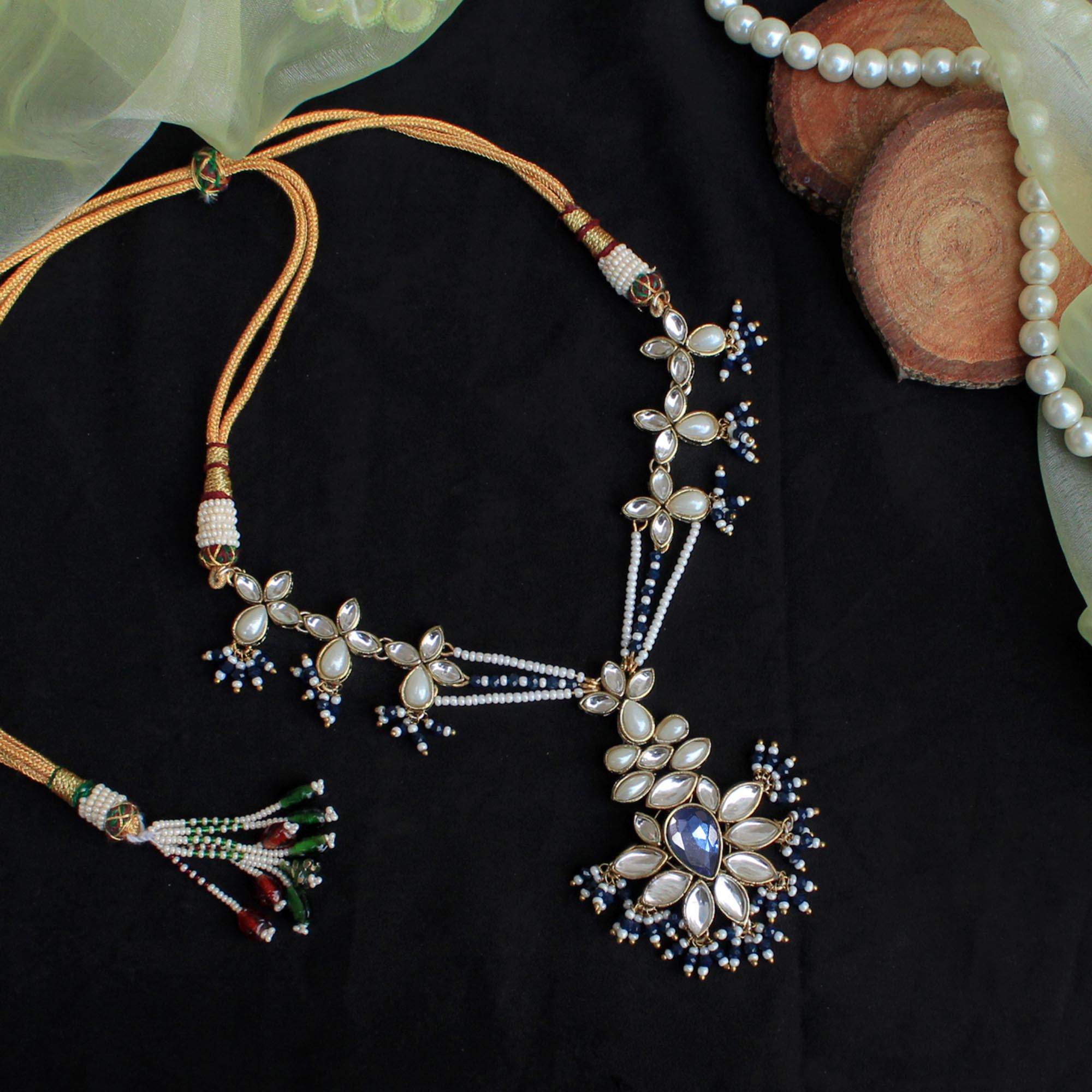 Kundan choker set in gold-tone with matching earrings and long bridal necklace, perfect for wedding functions , festive and bridal wear