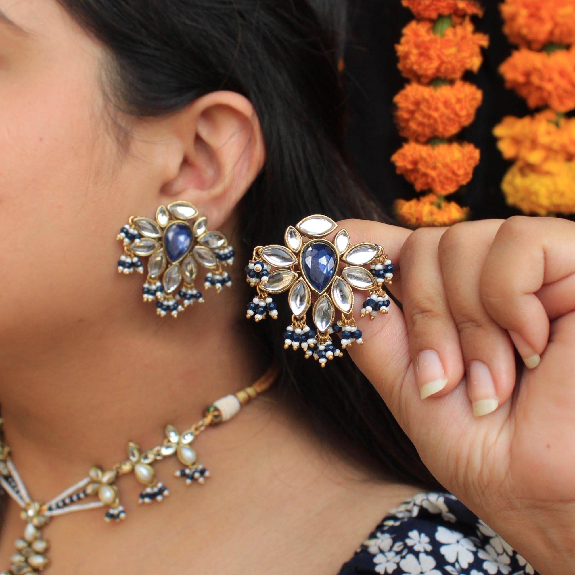 Kundan choker set in gold-tone with matching earrings and long bridal necklace, perfect for wedding functions , festive and bridal wear