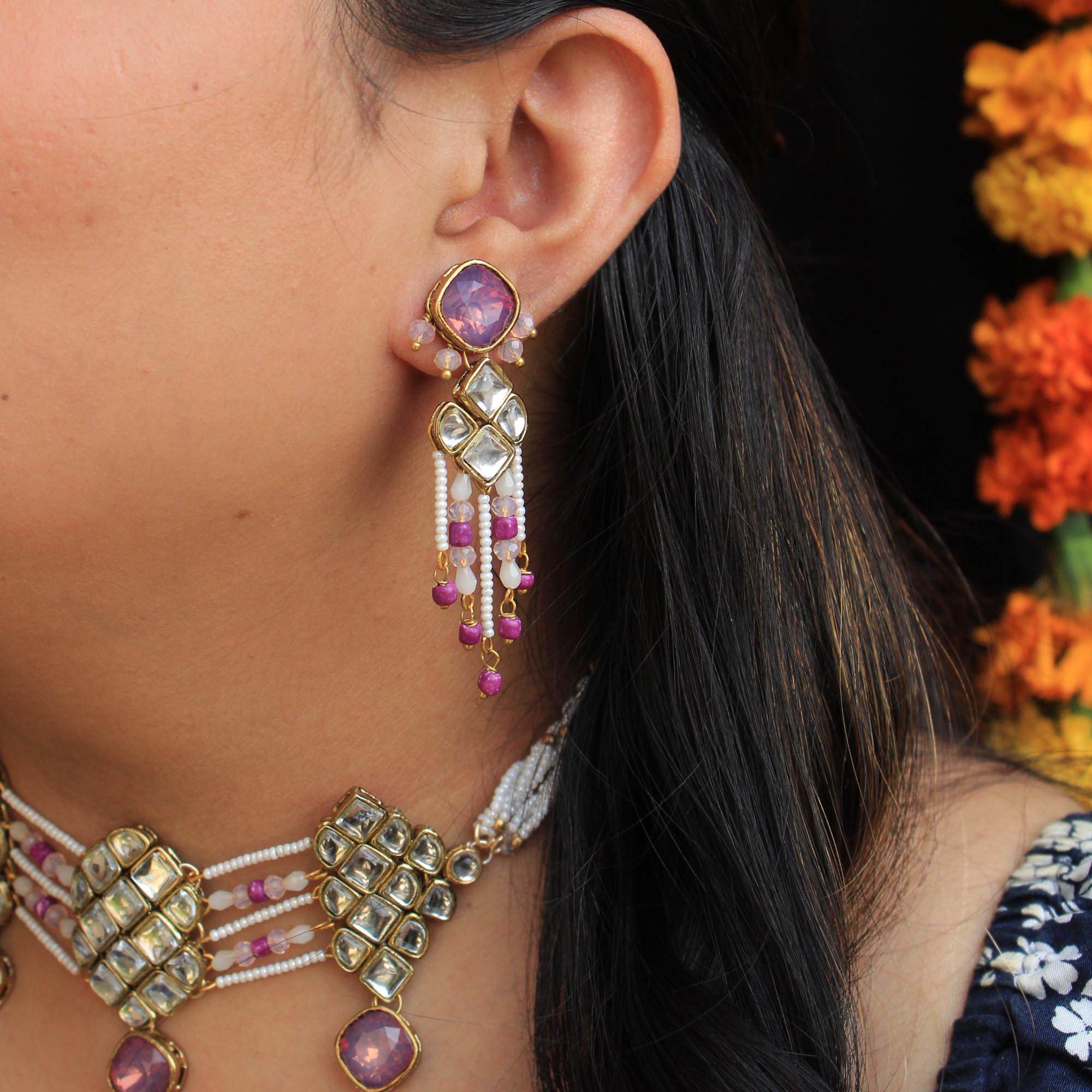 Kundan choker set in gold-tone with matching earrings and long bridal necklace, perfect for wedding functions , festive and bridal wear
