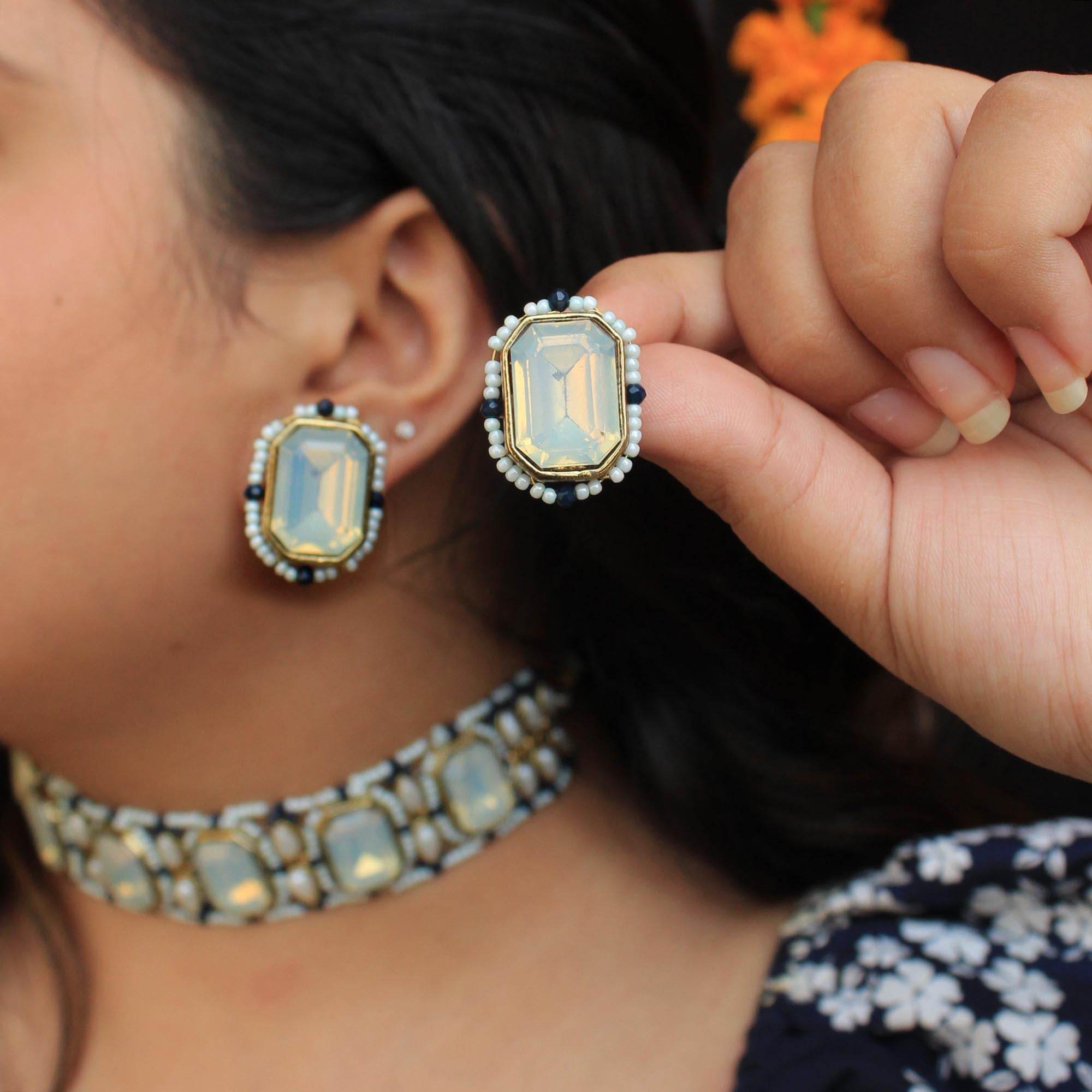 Kundan choker set in gold-tone with matching earrings and long bridal necklace, perfect for wedding functions , festive and bridal wear