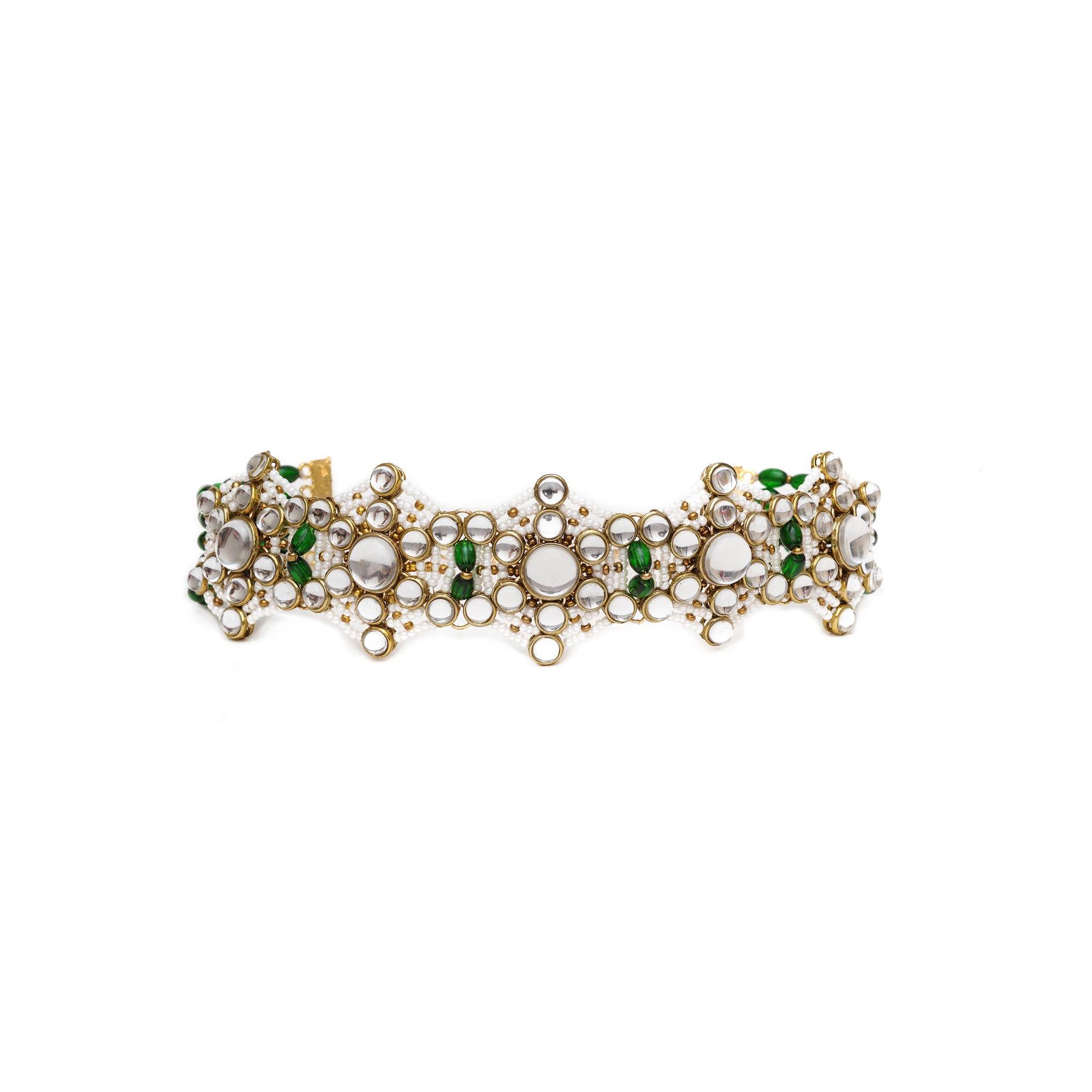 Kundan choker set in gold-tone with matching earrings and long bridal necklace, perfect for wedding functions , festive and bridal wear