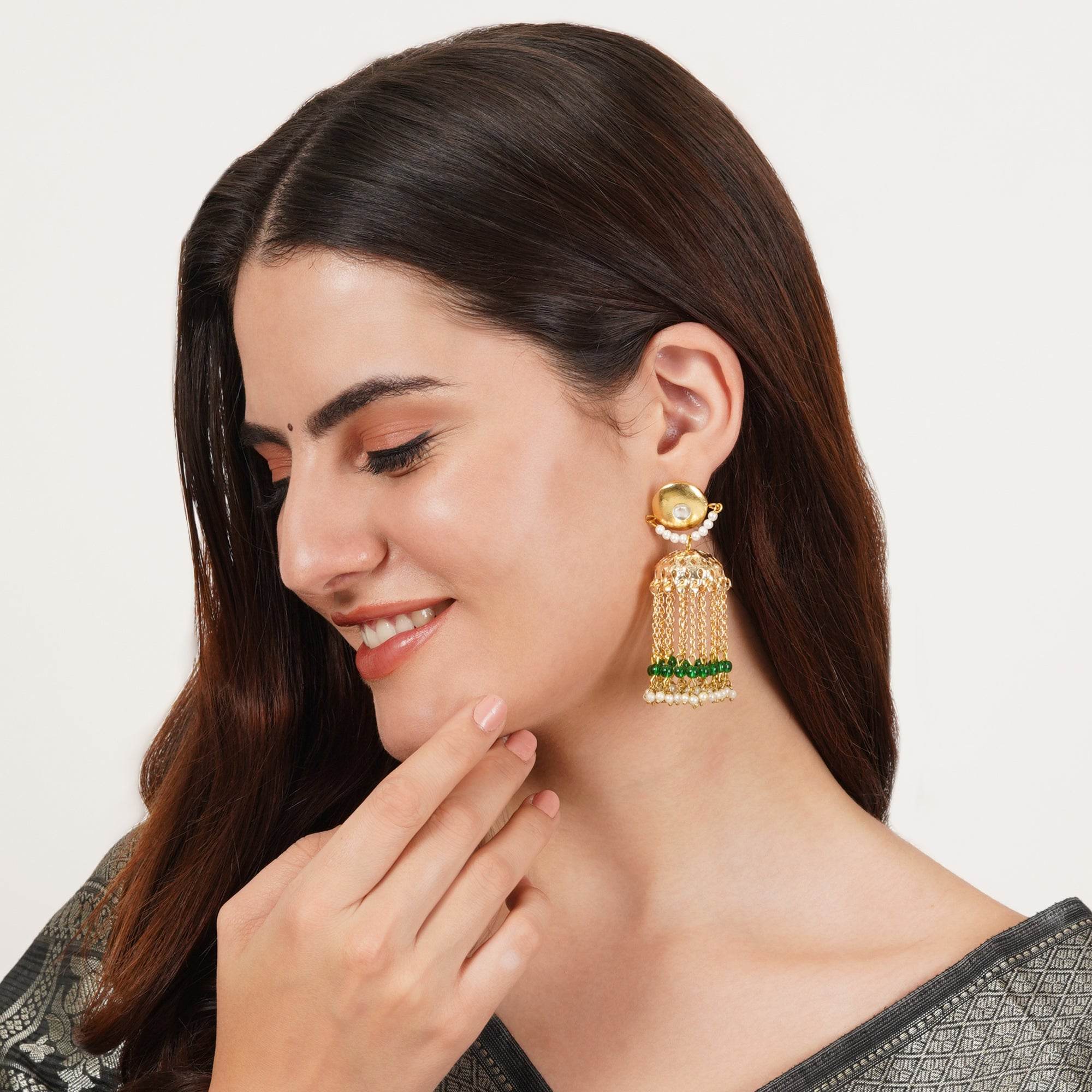 Traditional Kundan earrings in gold-tone, perfect for weddings and festive wear