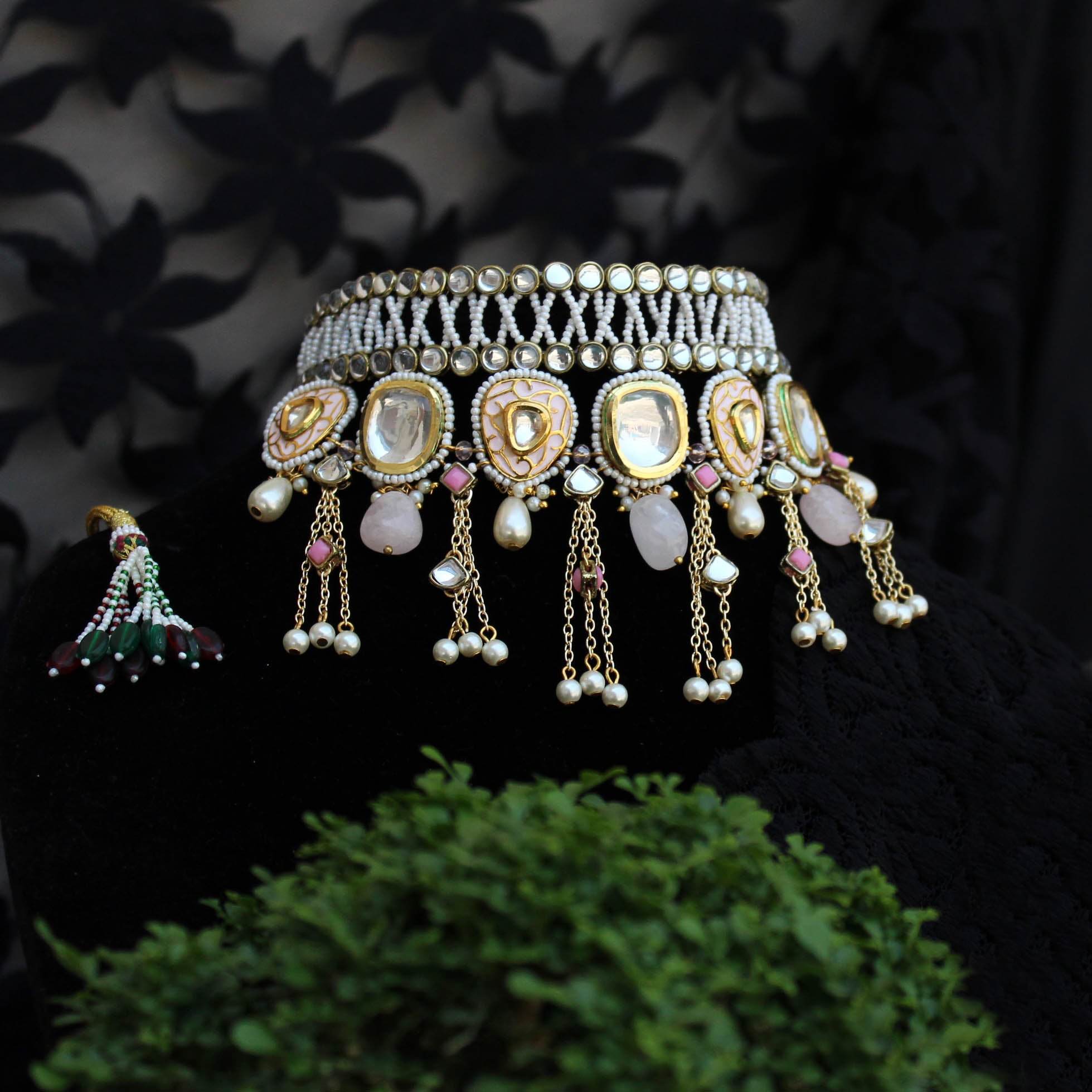 Kundan choker set in gold-tone with matching earrings and long bridal necklace, perfect for wedding functions , festive and bridal wear