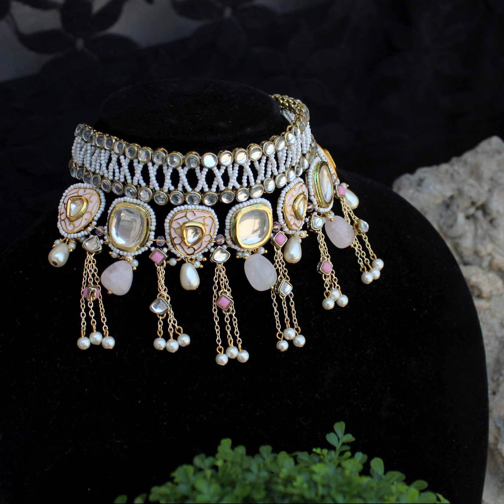 Kundan choker set in gold-tone with matching earrings and long bridal necklace, perfect for wedding functions , festive and bridal wear