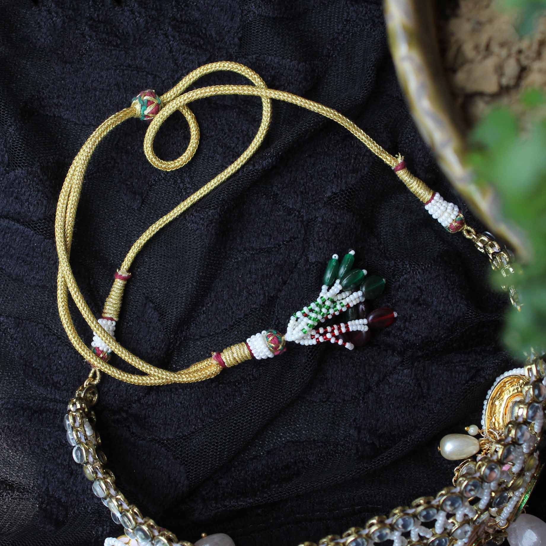 Kundan choker set in gold-tone with matching earrings and long bridal necklace, perfect for wedding functions , festive and bridal wear