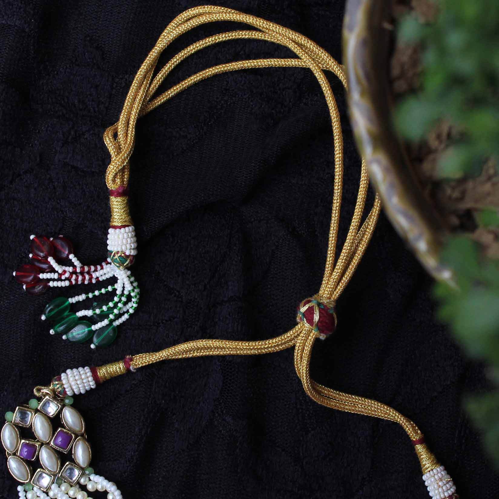 Kundan choker set in gold-tone with matching earrings and long bridal necklace, perfect for wedding functions , festive and bridal wear