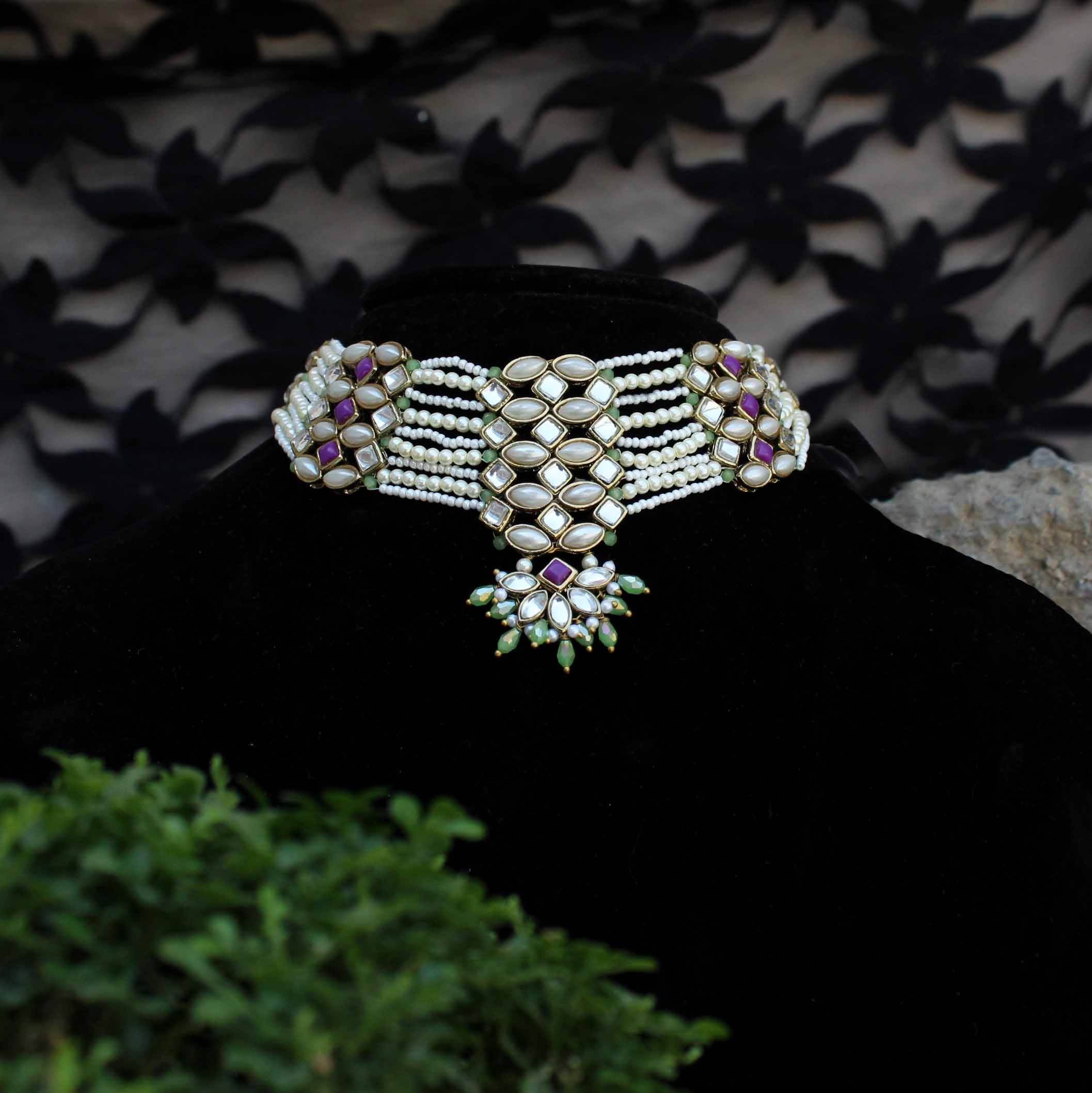 Kundan choker set in gold-tone with matching earrings and long bridal necklace, perfect for wedding functions , festive and bridal wear