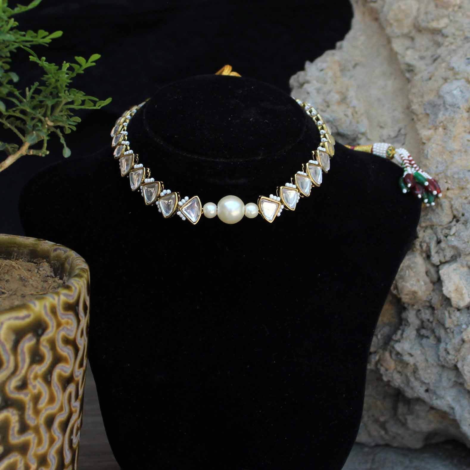 Kundan choker set in gold-tone with matching earrings and long bridal necklace, perfect for wedding functions , festive and bridal wear