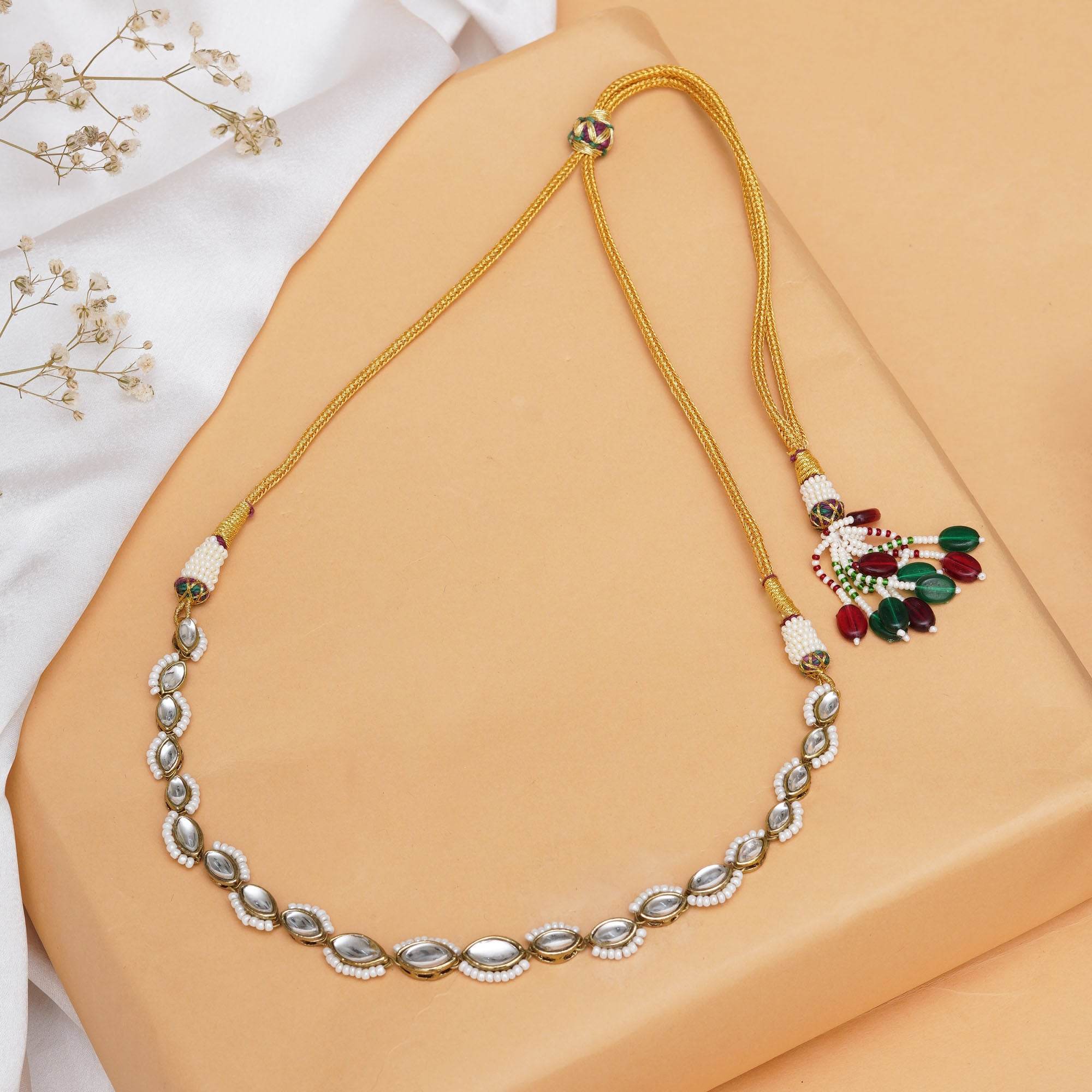 Kundan choker set in gold-tone with matching earrings and long bridal necklace, perfect for wedding functions , festive and bridal wear