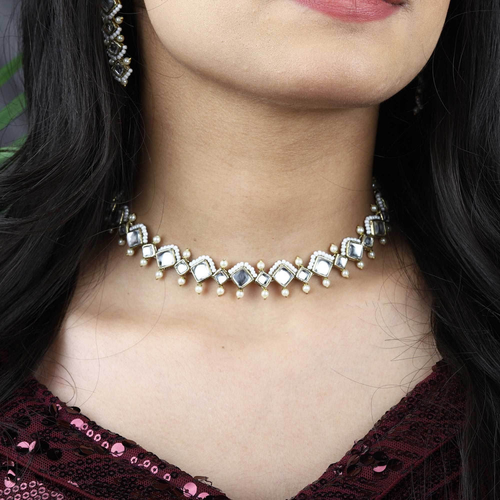 Kundan choker set in gold-tone with matching earrings and long bridal necklace, perfect for wedding functions , festive and bridal wear