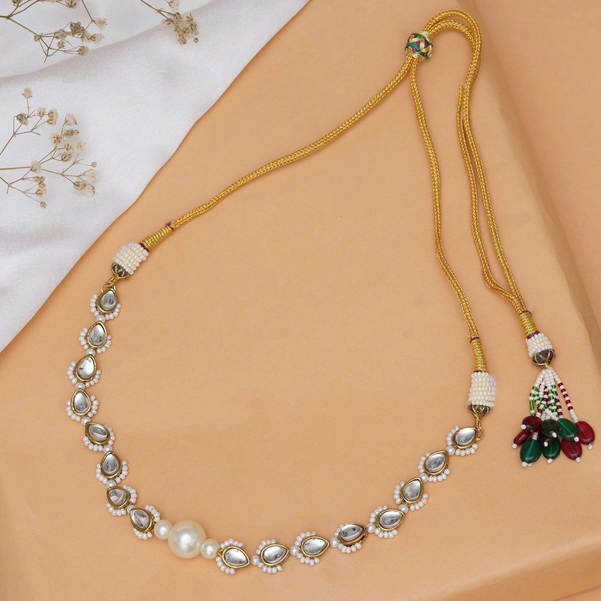 Kundan choker set in gold-tone with matching earrings and long bridal necklace, perfect for wedding functions , festive and bridal wear