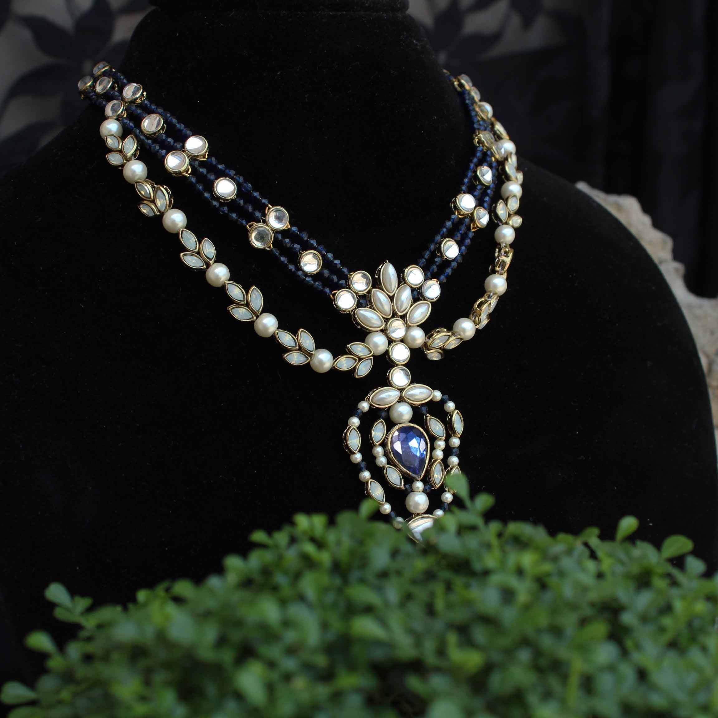 Kundan choker set in gold-tone with matching earrings and long bridal necklace, perfect for wedding functions , festive and bridal wear