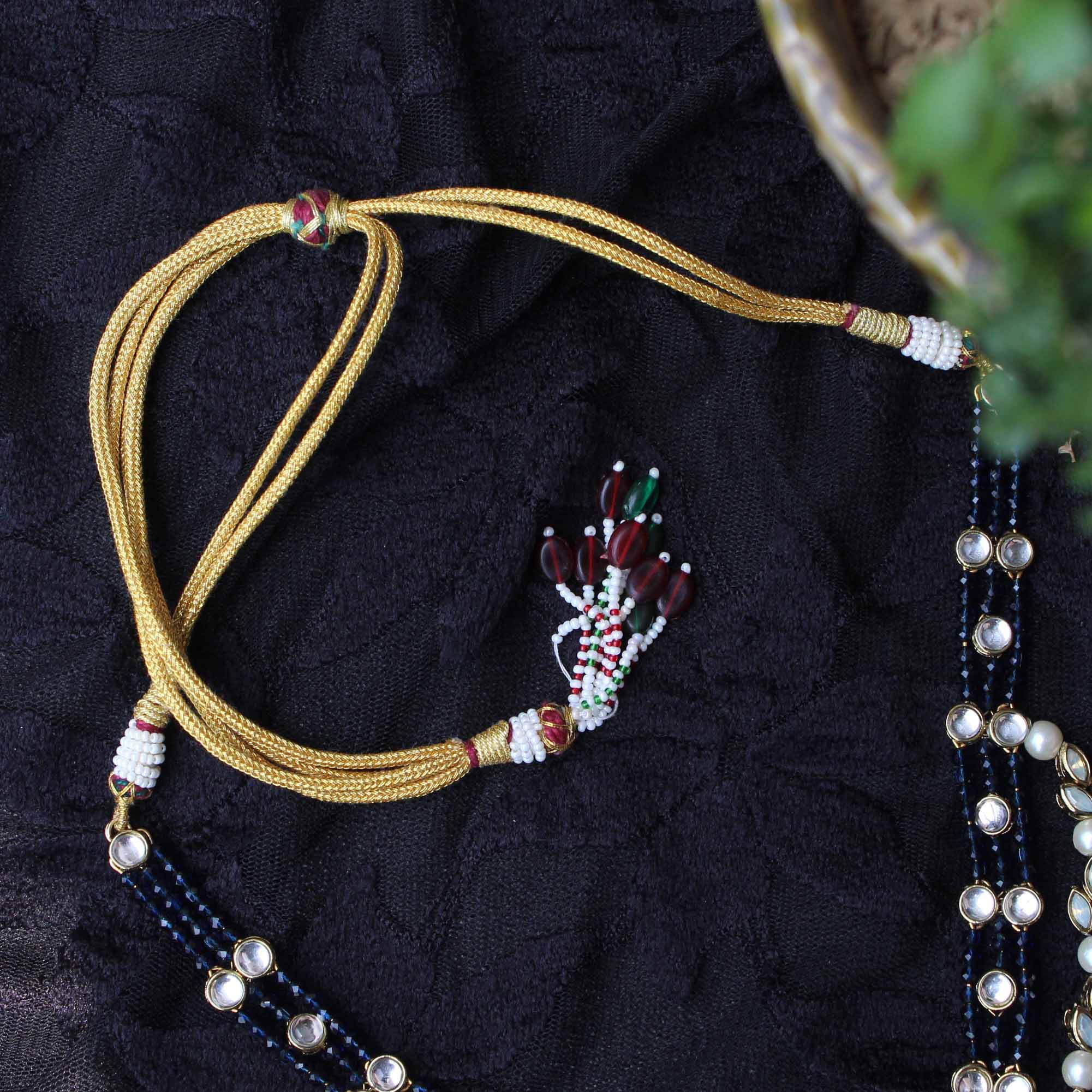 Kundan choker set in gold-tone with matching earrings and long bridal necklace, perfect for wedding functions , festive and bridal wear