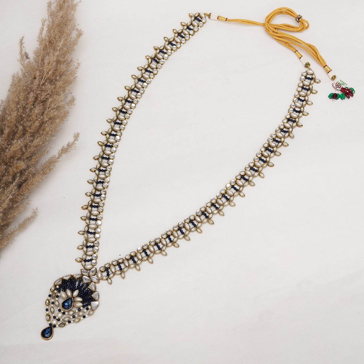Kundan choker set in gold-tone with matching earrings and long bridal necklace, perfect for wedding functions , festive and bridal wear