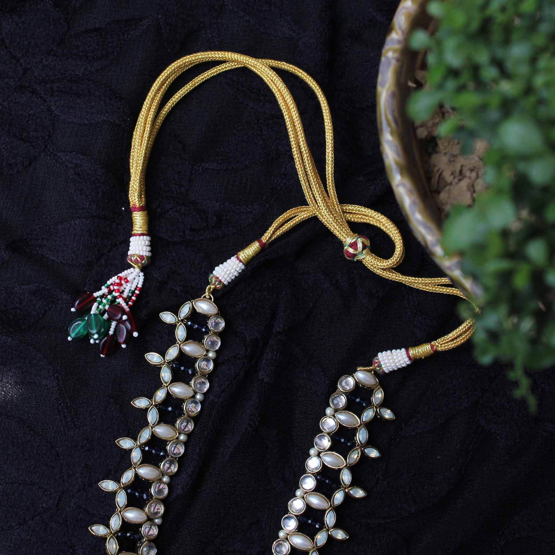 Kundan choker set in gold-tone with matching earrings and long bridal necklace, perfect for wedding functions , festive and bridal wear
