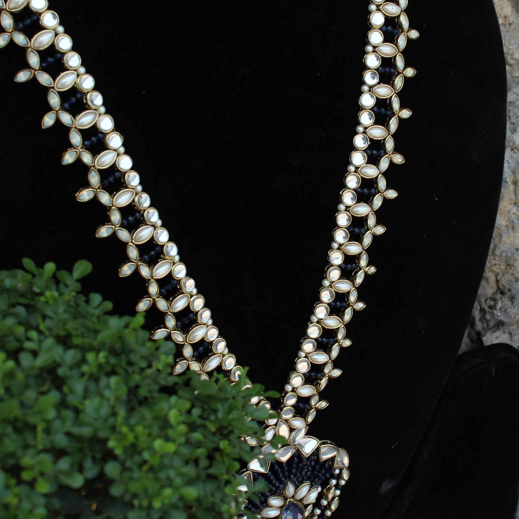 Kundan choker set in gold-tone with matching earrings and long bridal necklace, perfect for wedding functions , festive and bridal wear