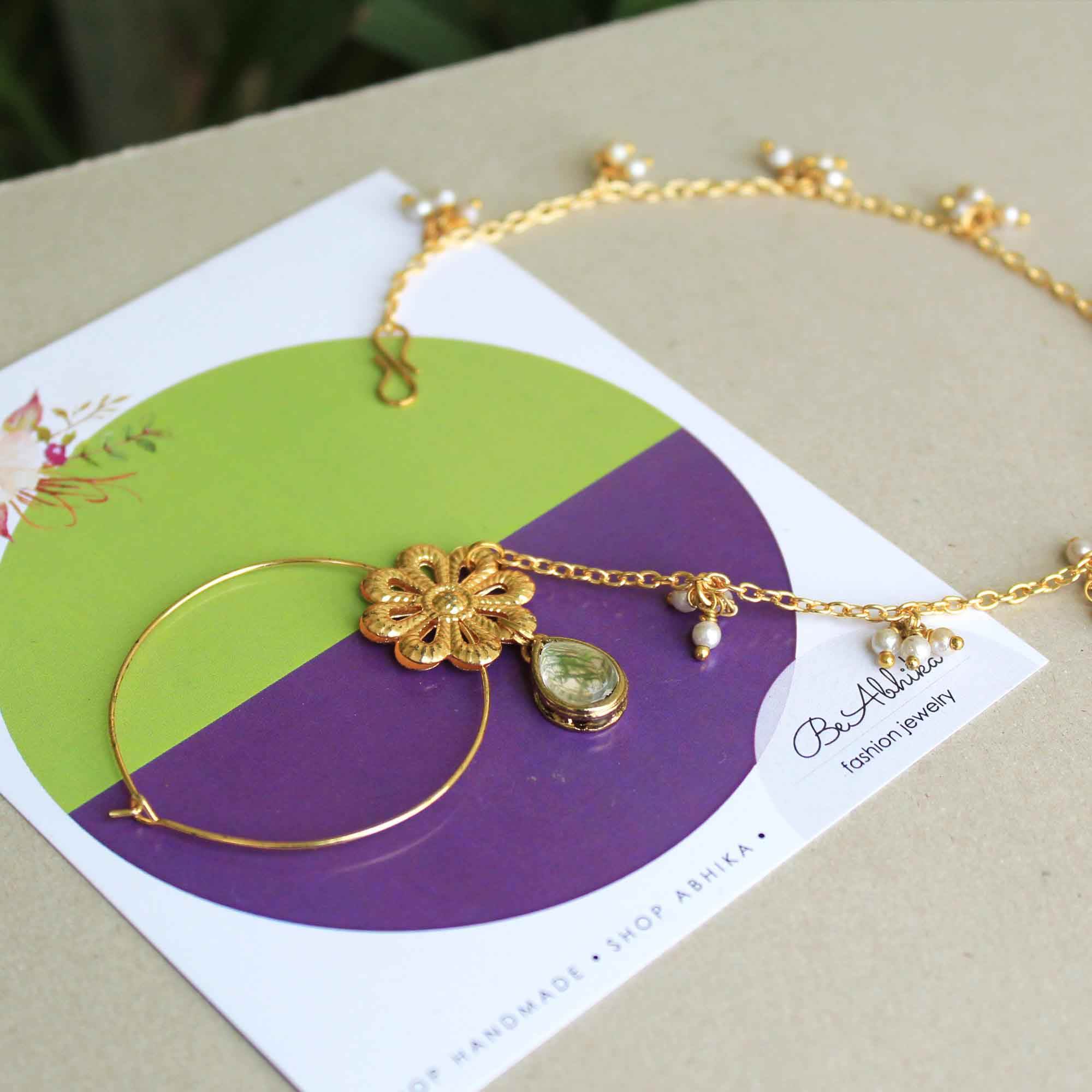 Traditional Indian bridal nath with kundan stones, green beads, and pearl hair chain Indian Nathiya Nathani Nose Ring