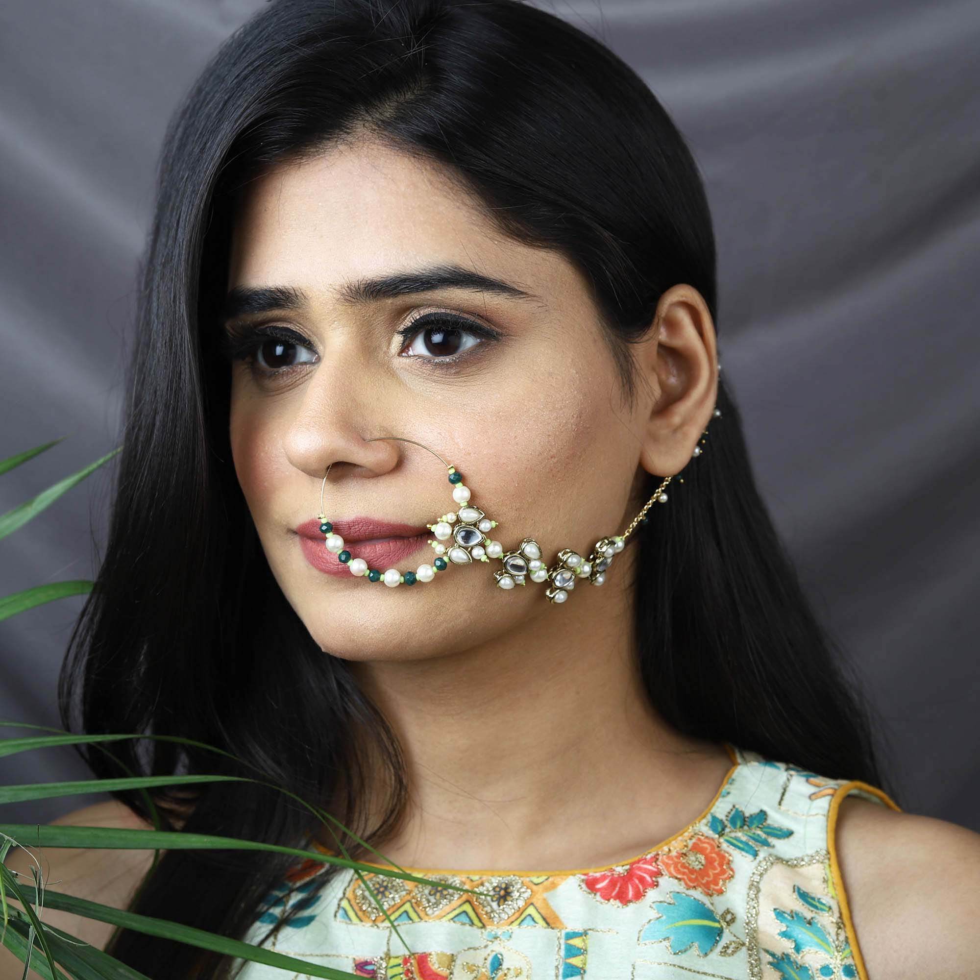 Traditional Indian bridal nath with kundan stones, green beads, and pearl hair chain Indian Nathiya Nathani Nose Ring