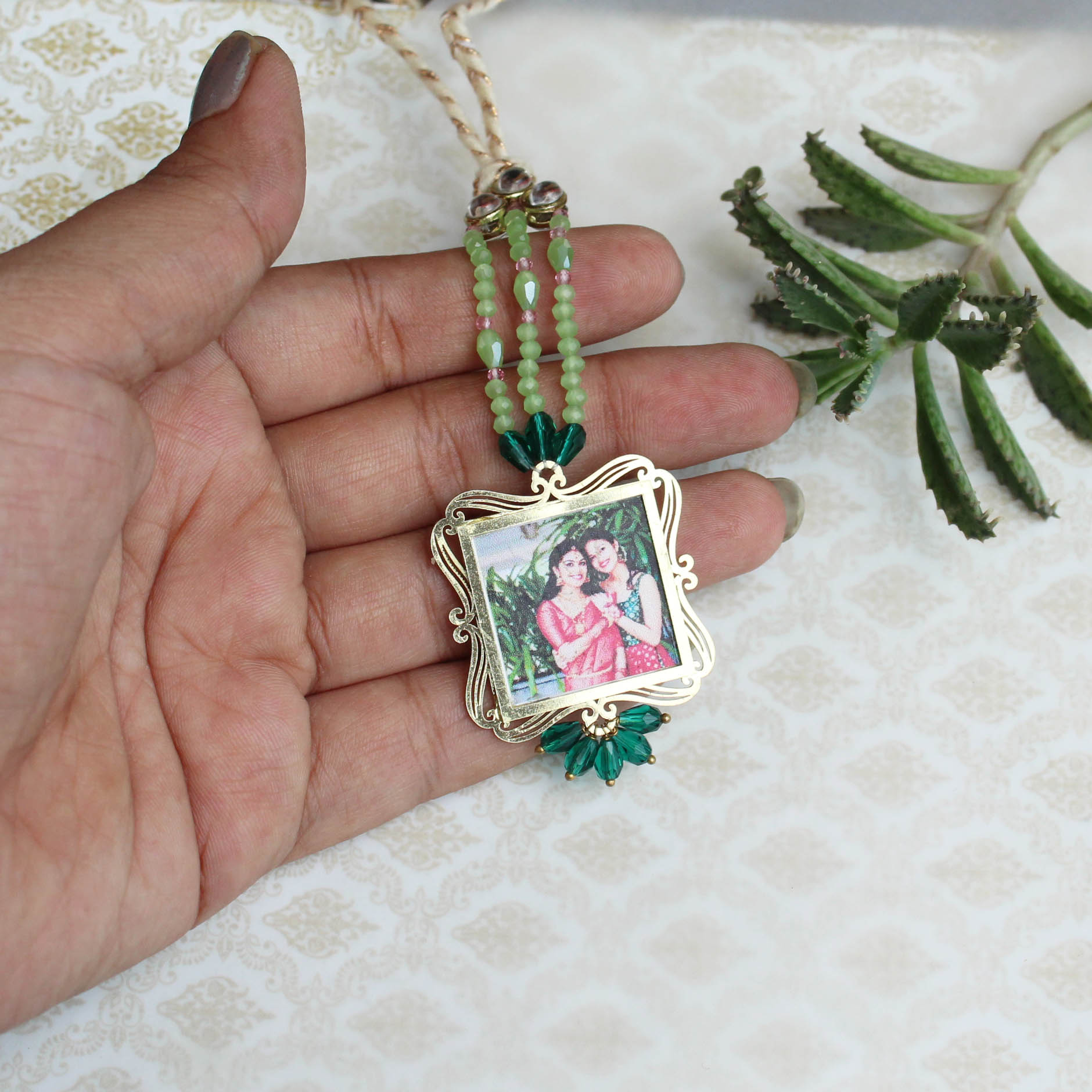 BeAbhika Gold Tone Kundan Green Beads Personalised Photo Frame Designer Unique Bhabhi Lumba Hanging Bhabhi Rakhi Lumba Customised Photo Sister In Law Rakhi Available Online In India Best Price Send Rakhi To Bhai COD Express Shipping