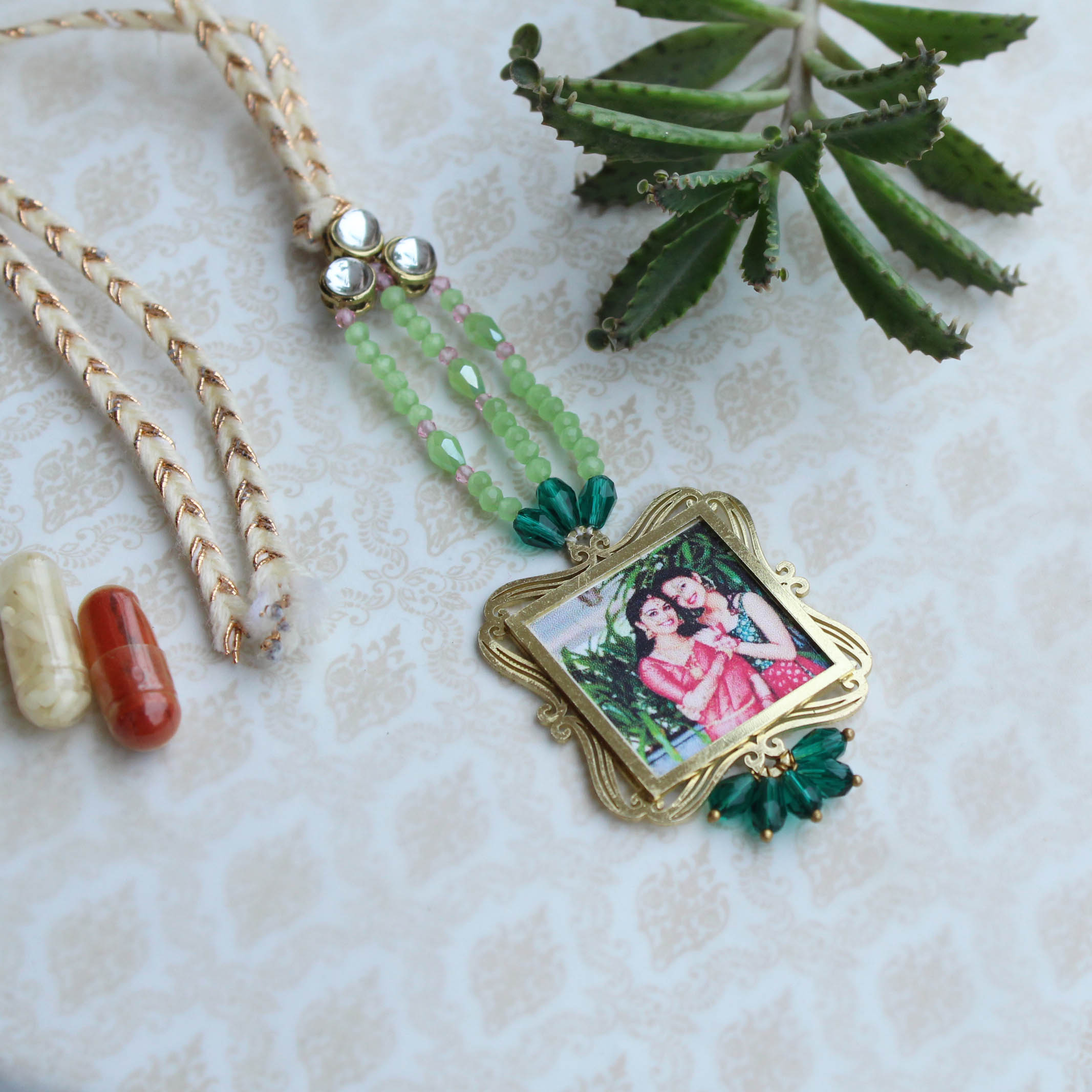 BeAbhika Gold Tone Kundan Green Beads Personalised Photo Frame Designer Unique Bhabhi Lumba Hanging Bhabhi Rakhi Lumba Customised Photo Sister In Law Rakhi Available Online In India Best Price Send Rakhi To Bhai COD Express Shipping