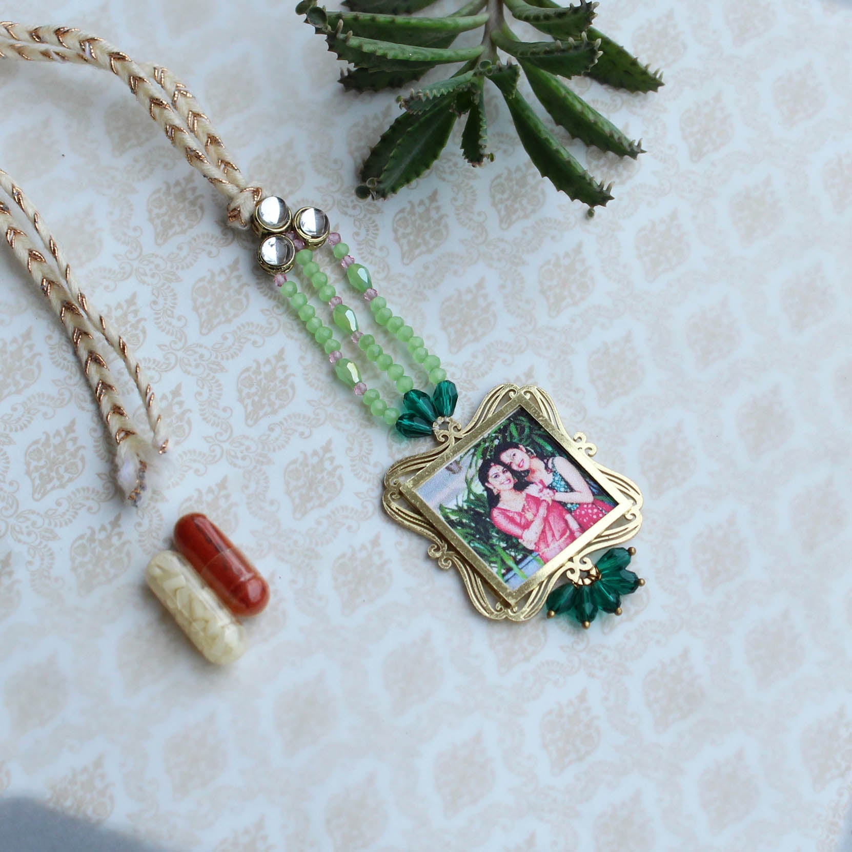 BeAbhika Gold Tone Kundan Green Beads Personalised Photo Frame Designer Unique Bhabhi Lumba Hanging Bhabhi Rakhi Lumba Customised Photo Sister In Law Rakhi Available Online In India Best Price Send Rakhi To Bhai COD Express Shipping