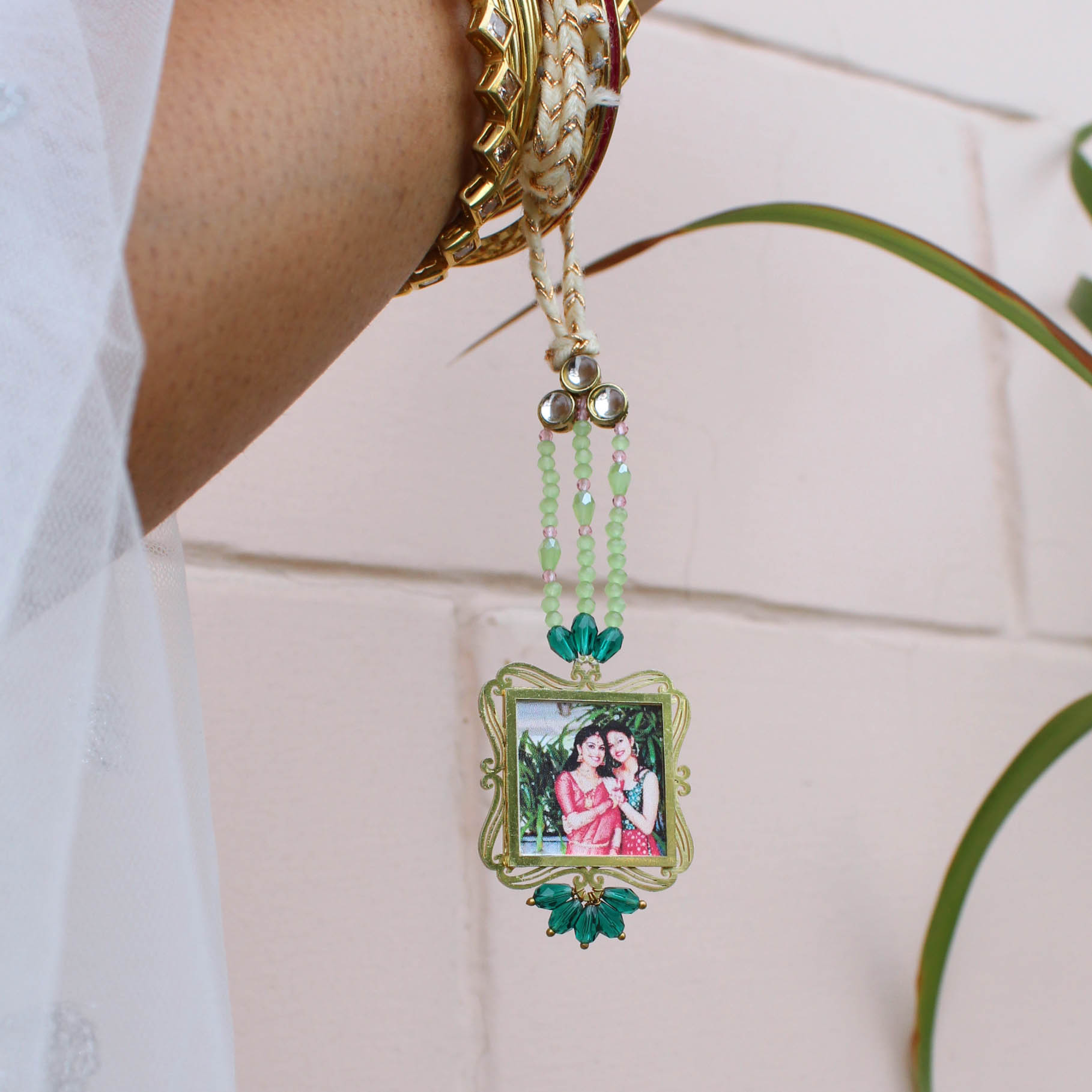 BeAbhika Gold Tone Kundan Green Beads Personalised Photo Frame Designer Unique Bhabhi Lumba Hanging Bhabhi Rakhi Lumba Customised Photo Sister In Law Rakhi Available Online In India Best Price Send Rakhi To Bhai COD Express Shipping