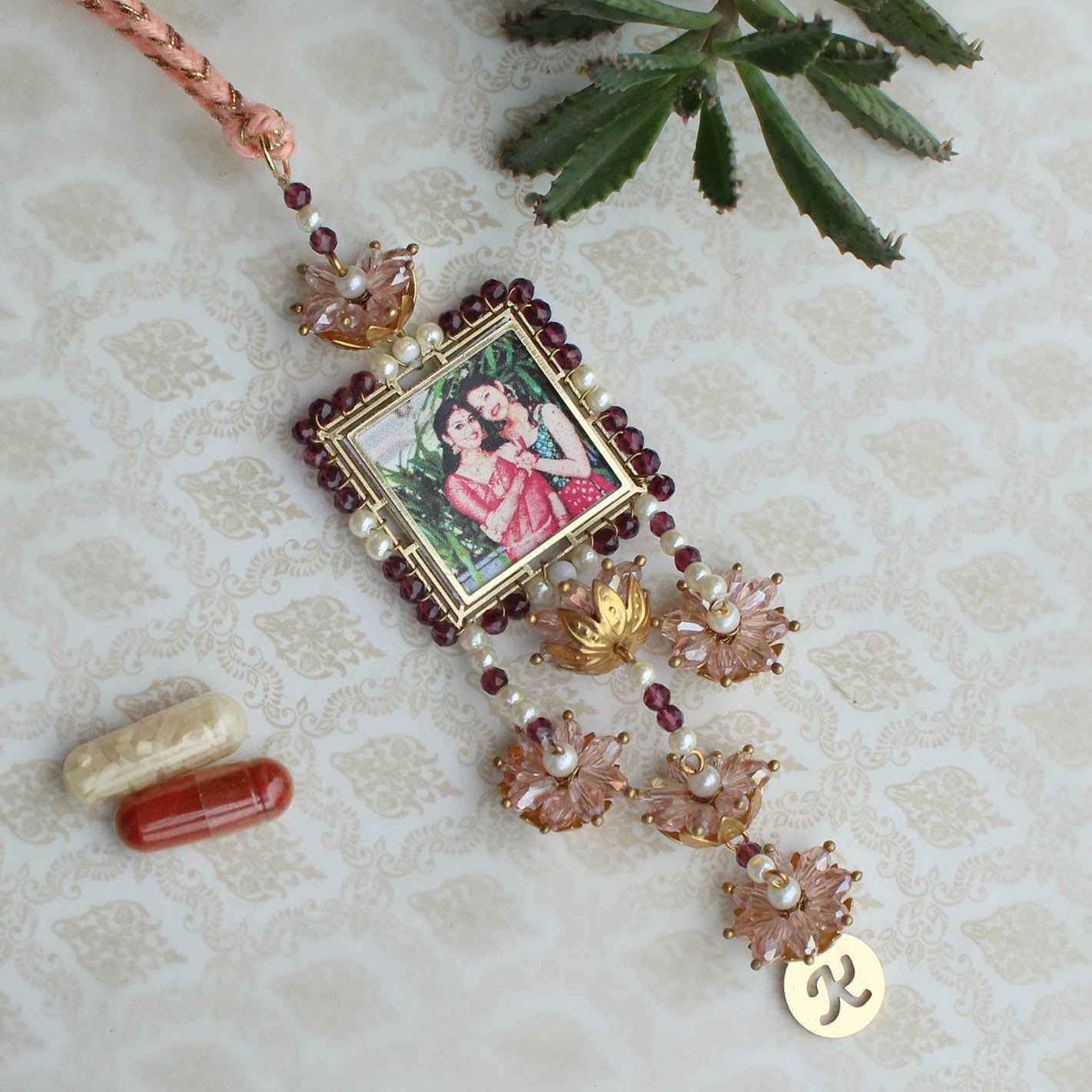 BeAbhika Gold Tone Kundan Green Beads Personalised Photo Frame Designer Unique Bhabhi Lumba Hanging Bhabhi Rakhi Lumba Customised Photo Sister In Law Rakhi Available Online In India Best Price Send Rakhi To Bhai COD Express Shipping Name Initial Letter Lumba Customised