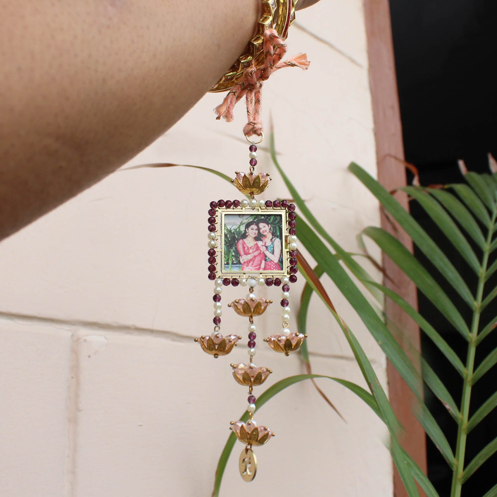 BeAbhika Gold Tone Kundan Green Beads Personalised Photo Frame Designer Unique Bhabhi Lumba Hanging Bhabhi Rakhi Lumba Customised Photo Sister In Law Rakhi Available Online In India Best Price Send Rakhi To Bhai COD Express Shipping Name Initial Letter Lumba Customised
