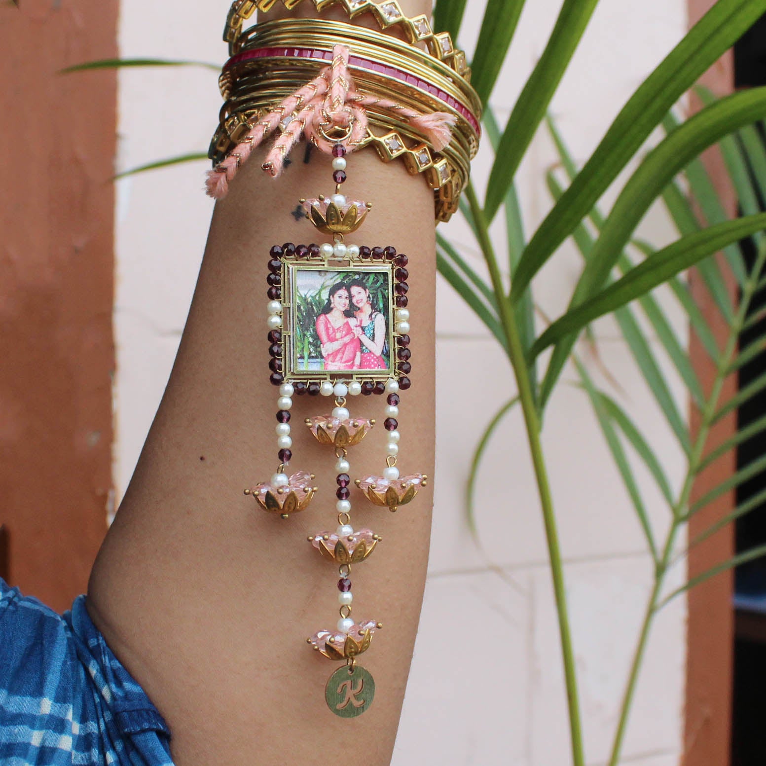 BeAbhika Gold Tone Kundan Green Beads Personalised Photo Frame Designer Unique Bhabhi Lumba Hanging Bhabhi Rakhi Lumba Customised Photo Sister In Law Rakhi Available Online In India Best Price Send Rakhi To Bhai COD Express Shipping Name Initial Letter Lumba Customised
