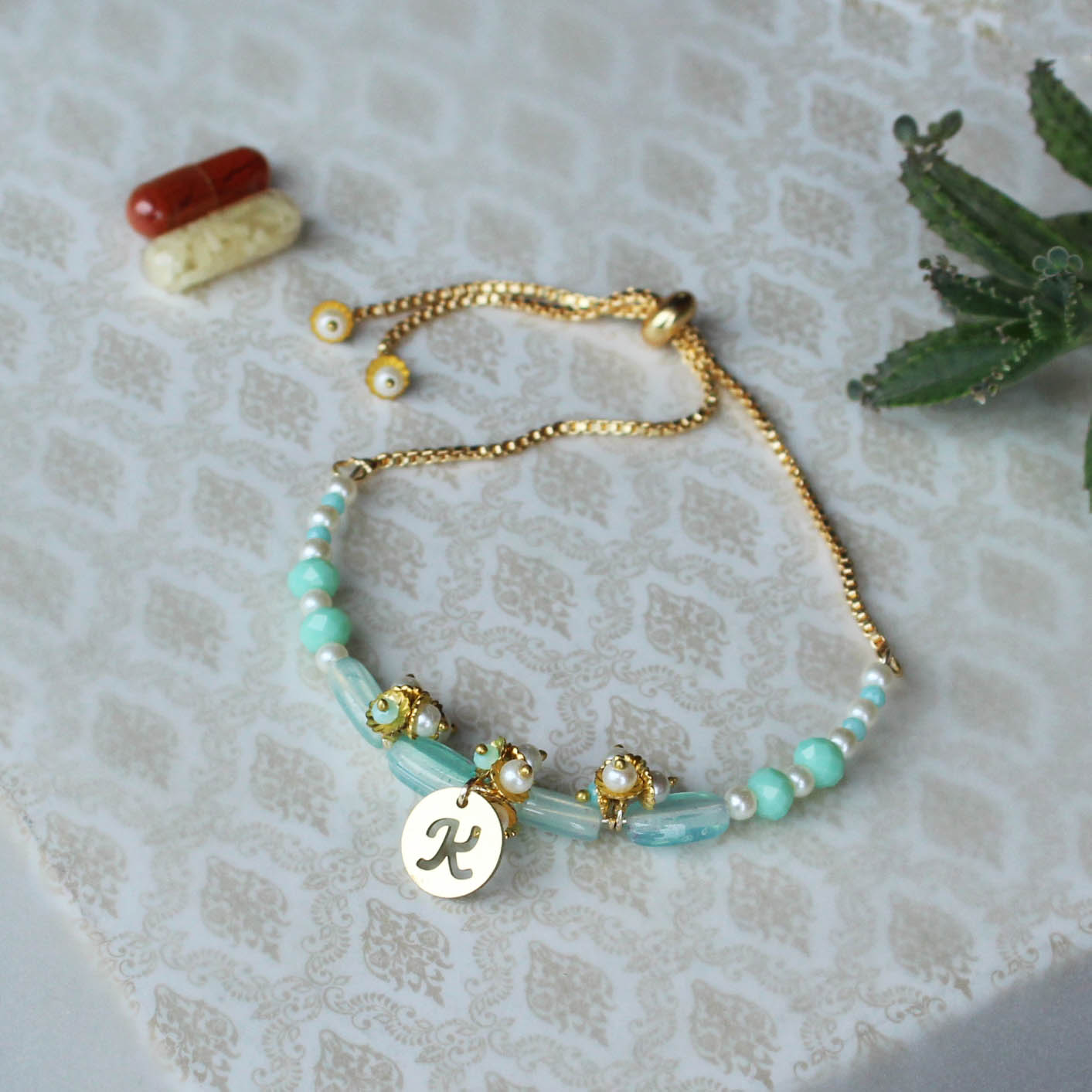 BeAbhika Blue Beads Personalised Bracelet Lumba Bhabhi Rakhi Designer Unique Rakhi For Sister In Law Customise Name Initial Letter Lumba Bracelet Style Available In India Online Best Price COD Available Express Shipping Send Rakhi To Bhai