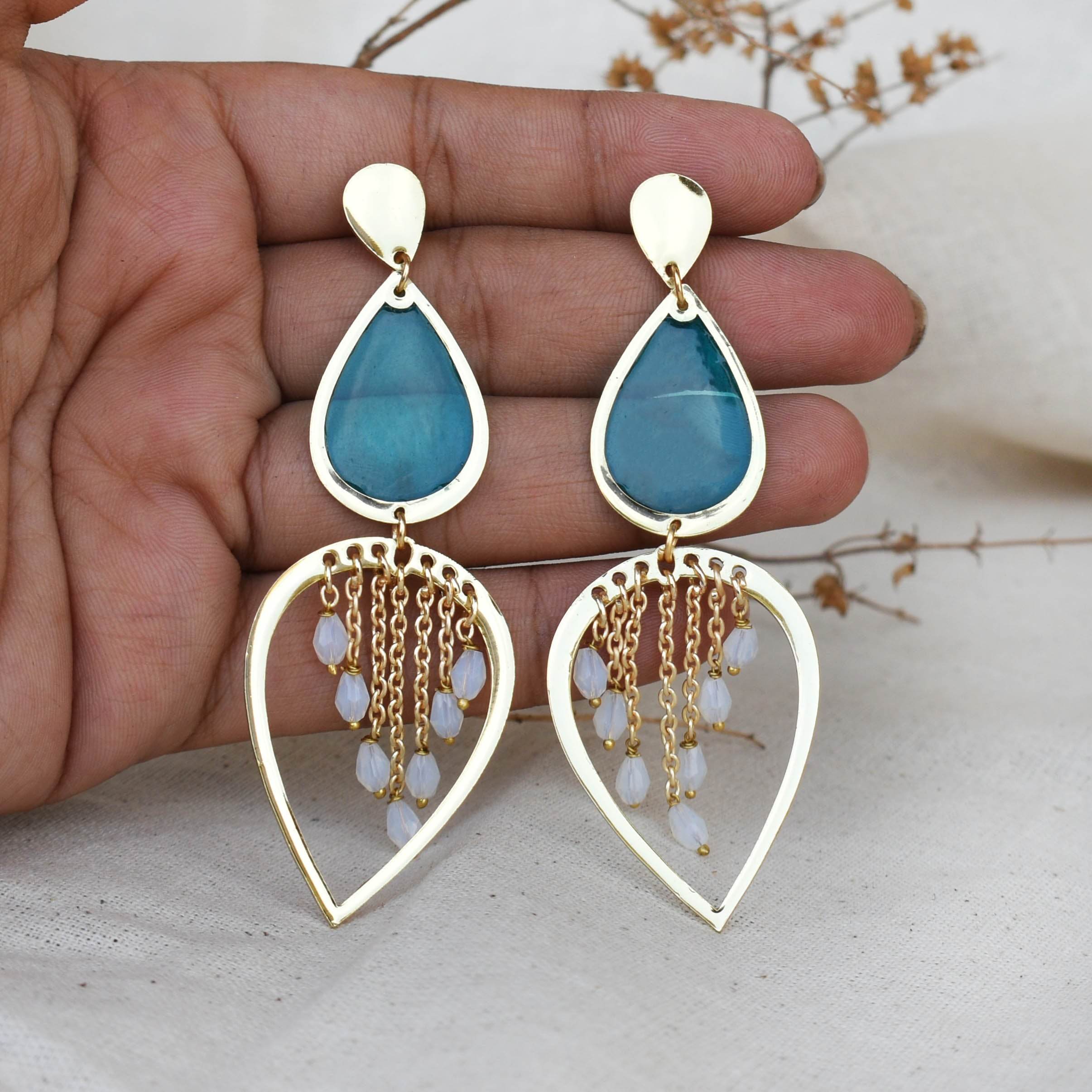 Traditional Kundan earrings in gold-tone, perfect for weddings and festive wear