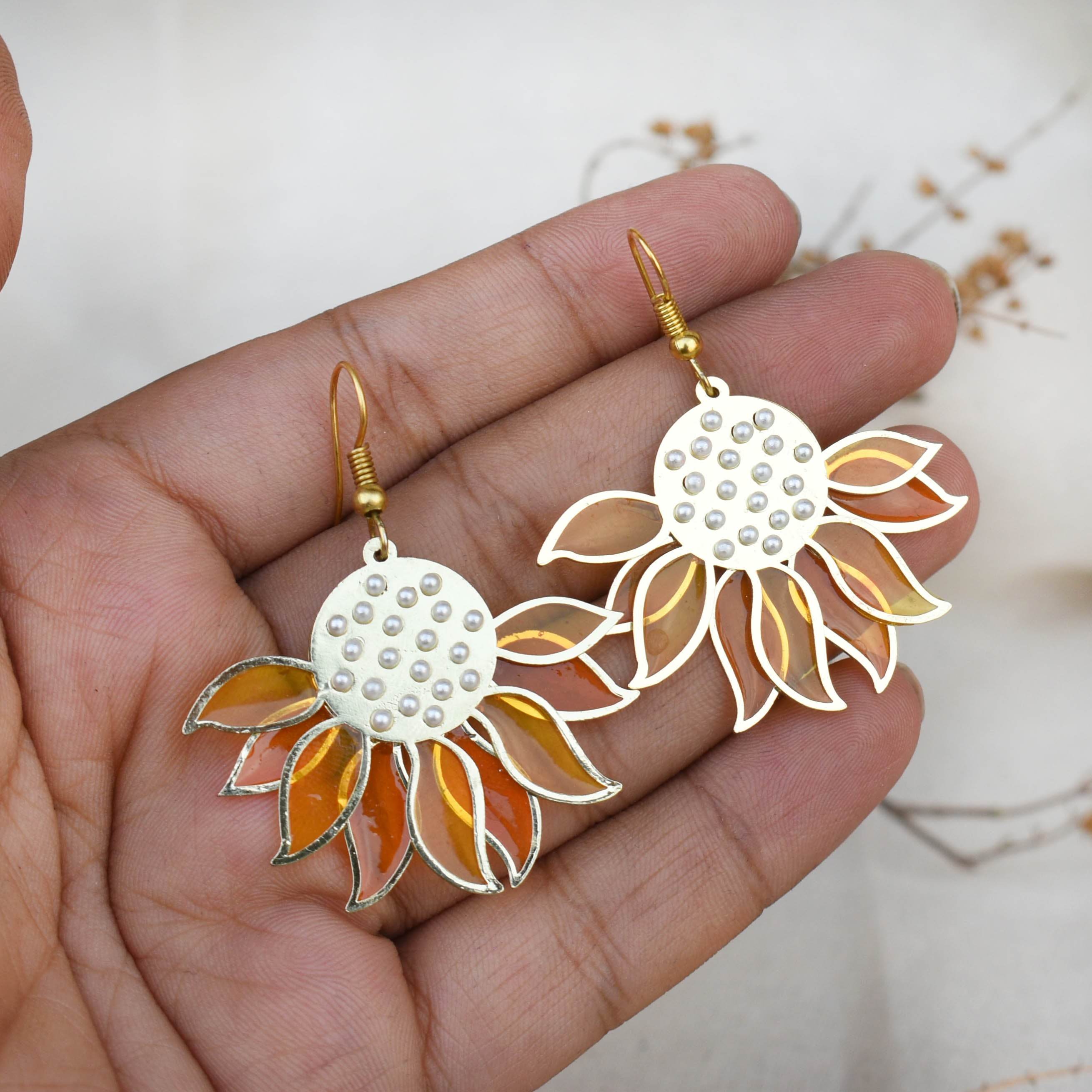 Traditional Kundan earrings in gold-tone, perfect for weddings and festive wear