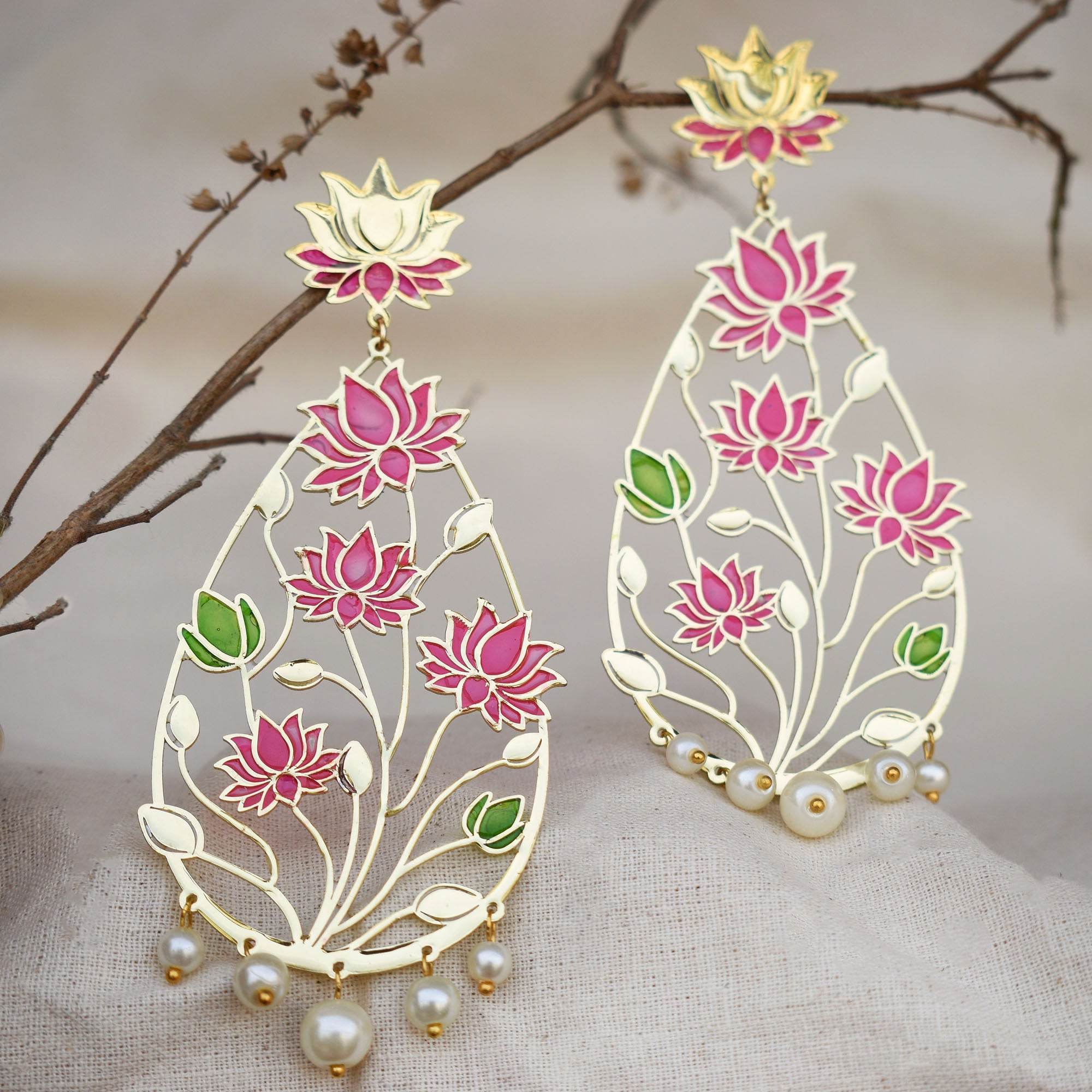 Traditional Kundan earrings in gold-tone, perfect for weddings and festive wear