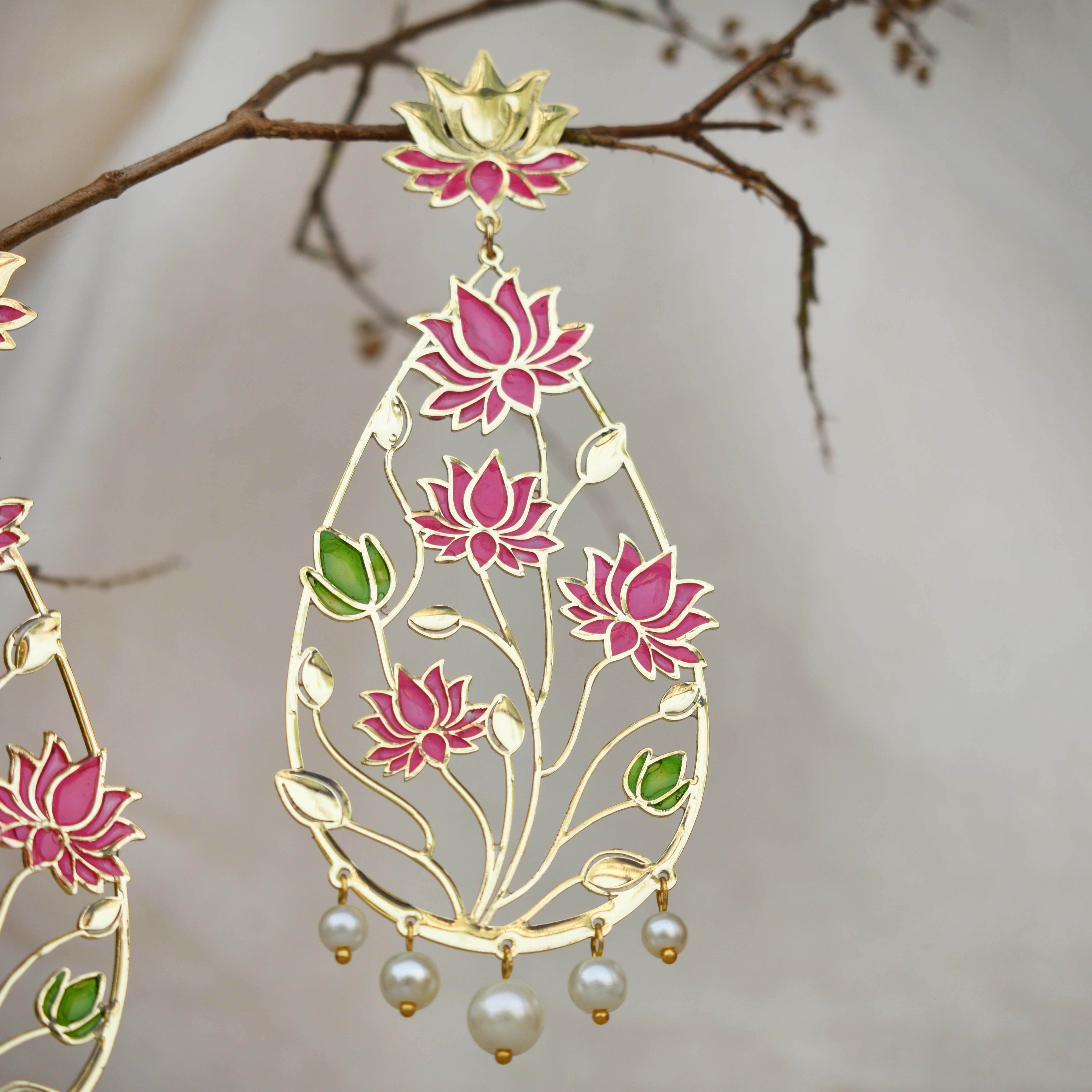 Traditional Kundan earrings in gold-tone, perfect for weddings and festive wear