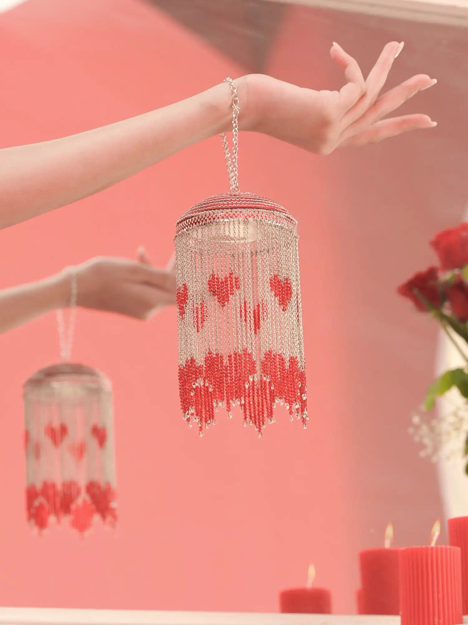 Statement bridal Kaleere with red beaded heart detailing and cascading silver chains from the Darpan kalire collection by BeAbhika