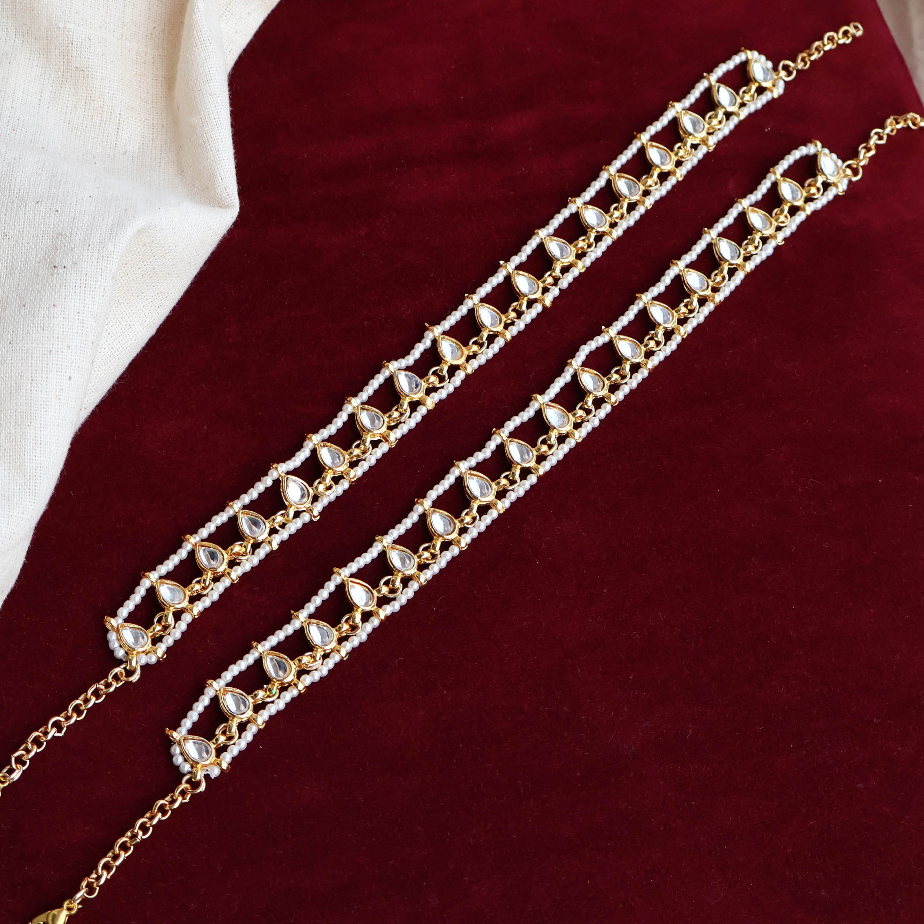 Regal Bridal Jewelry Set: Necklace, Maangtikka, Earrings, Hathphool, Anklet & Maangtikka - BeAbhika.com