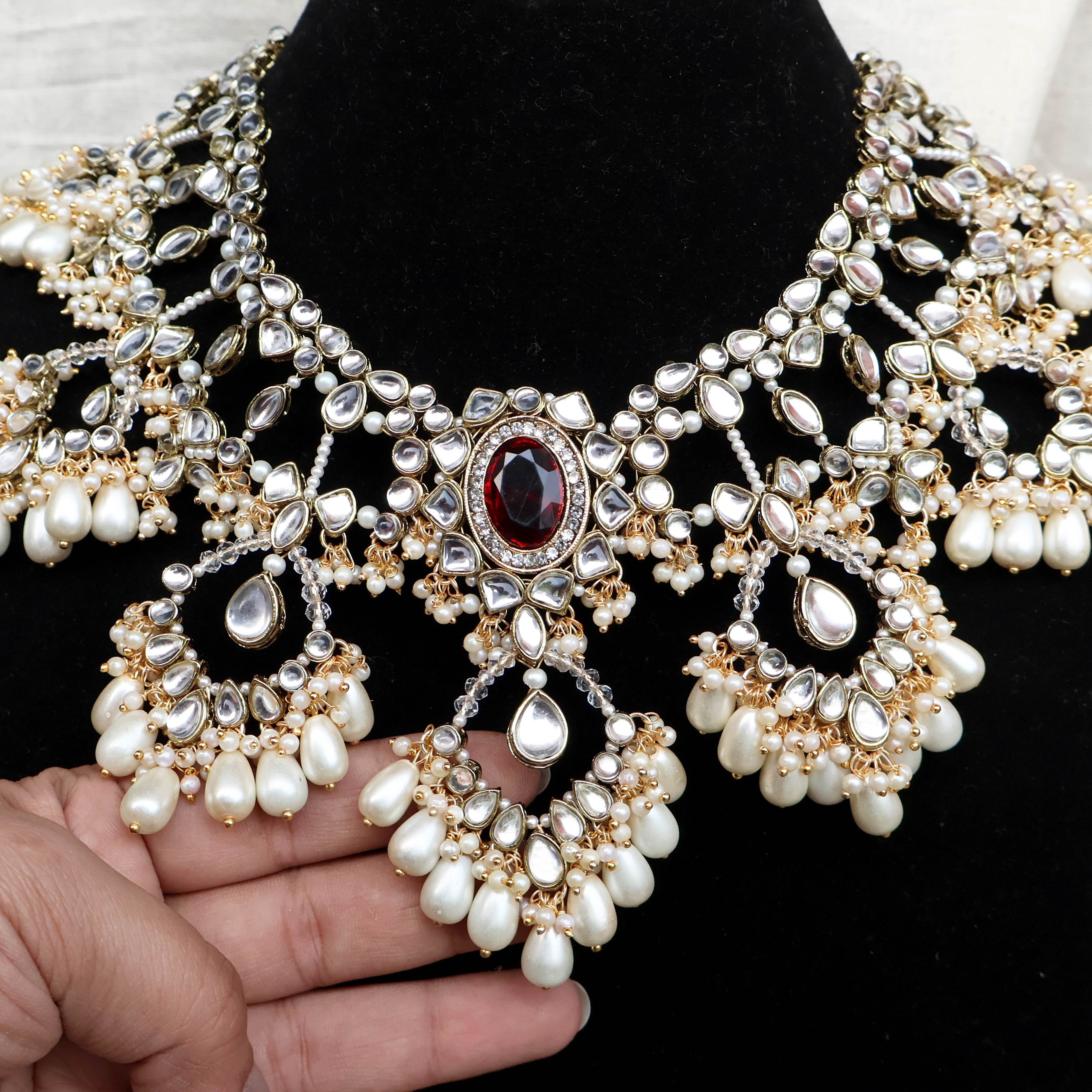 Regal Bridal Jewelry Set: Necklace, Maangtikka, Earrings, Hathphool, Anklet & Maangtikka - BeAbhika.com