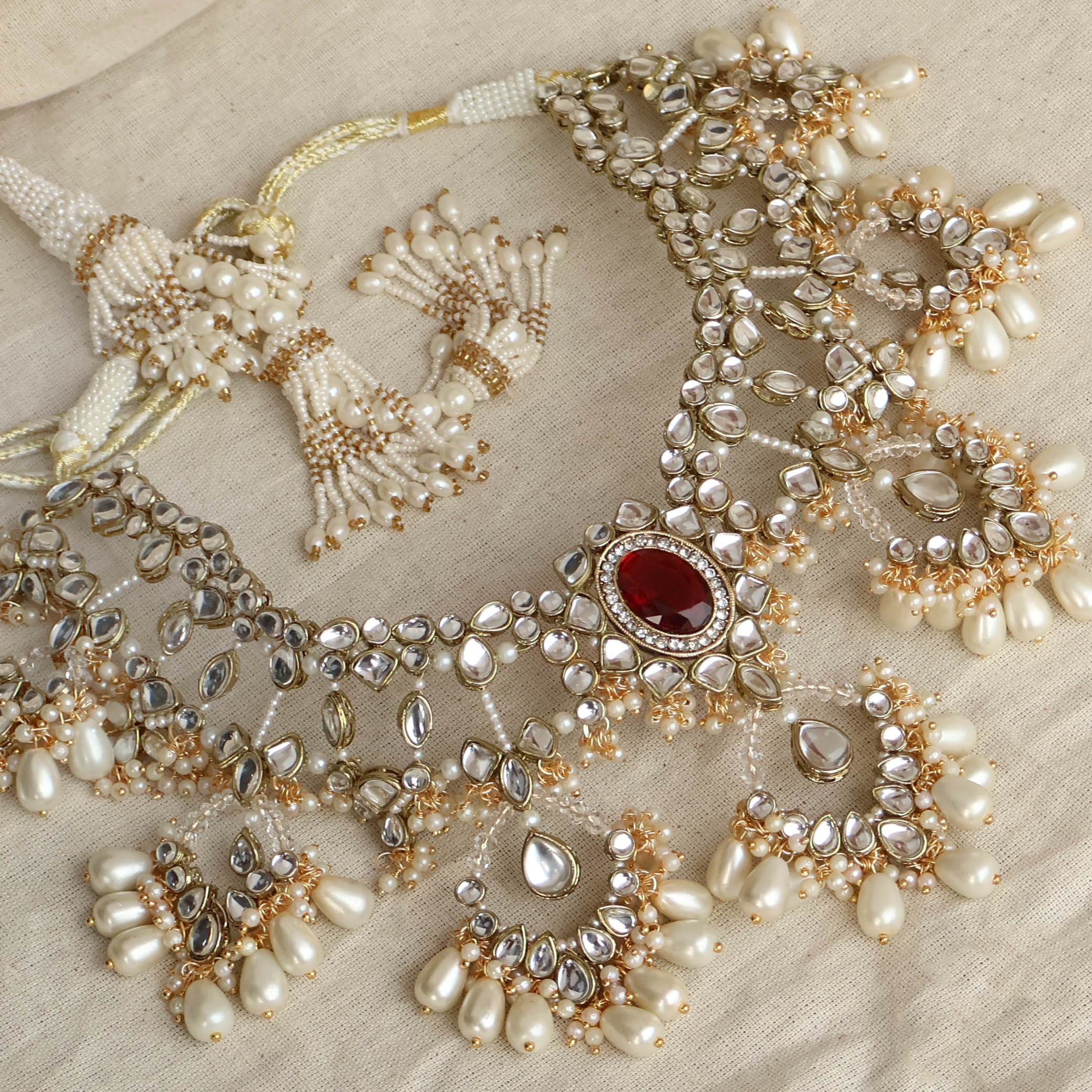 Regal Bridal Jewelry Set: Necklace, Maangtikka, Earrings, Hathphool, Anklet & Maangtikka - BeAbhika.com