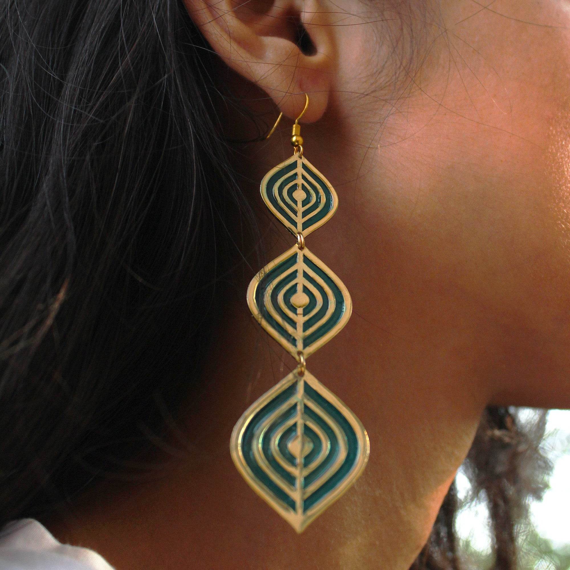 Traditional Kundan earrings in gold-tone, perfect for weddings and festive wear