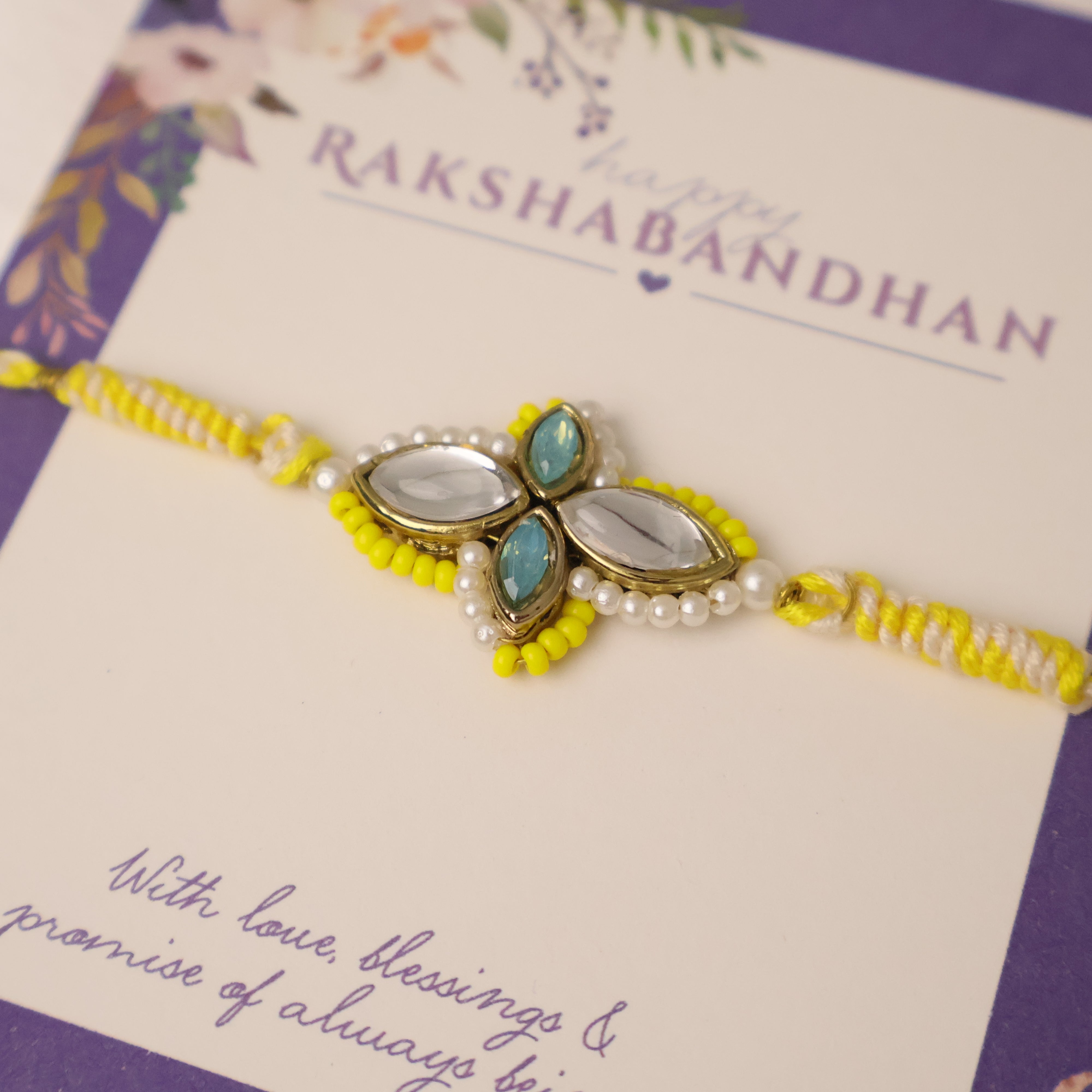 Yellow Kundan Floral Pearl Rakhi