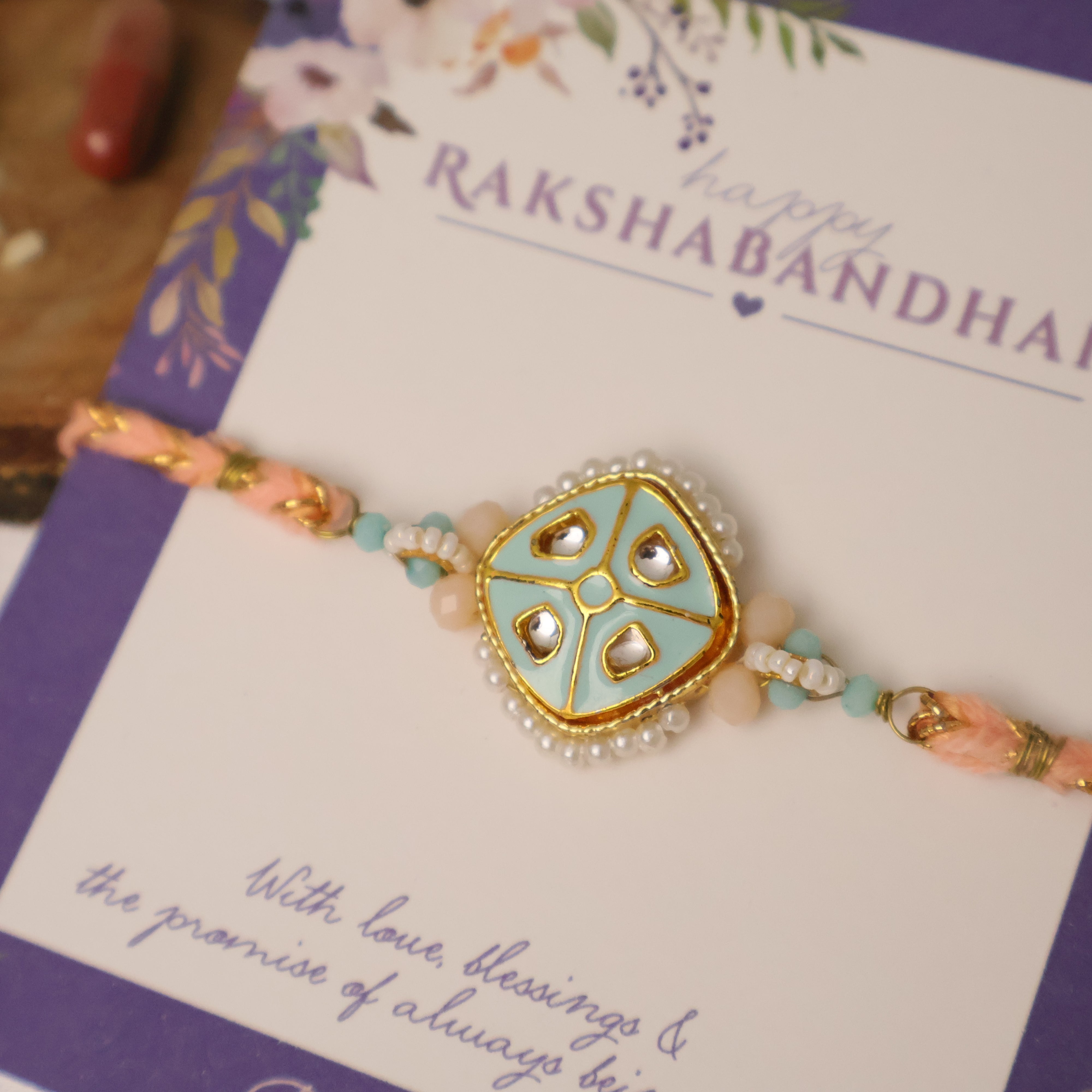 Pastel Kundan Pearl Charm Rakhi