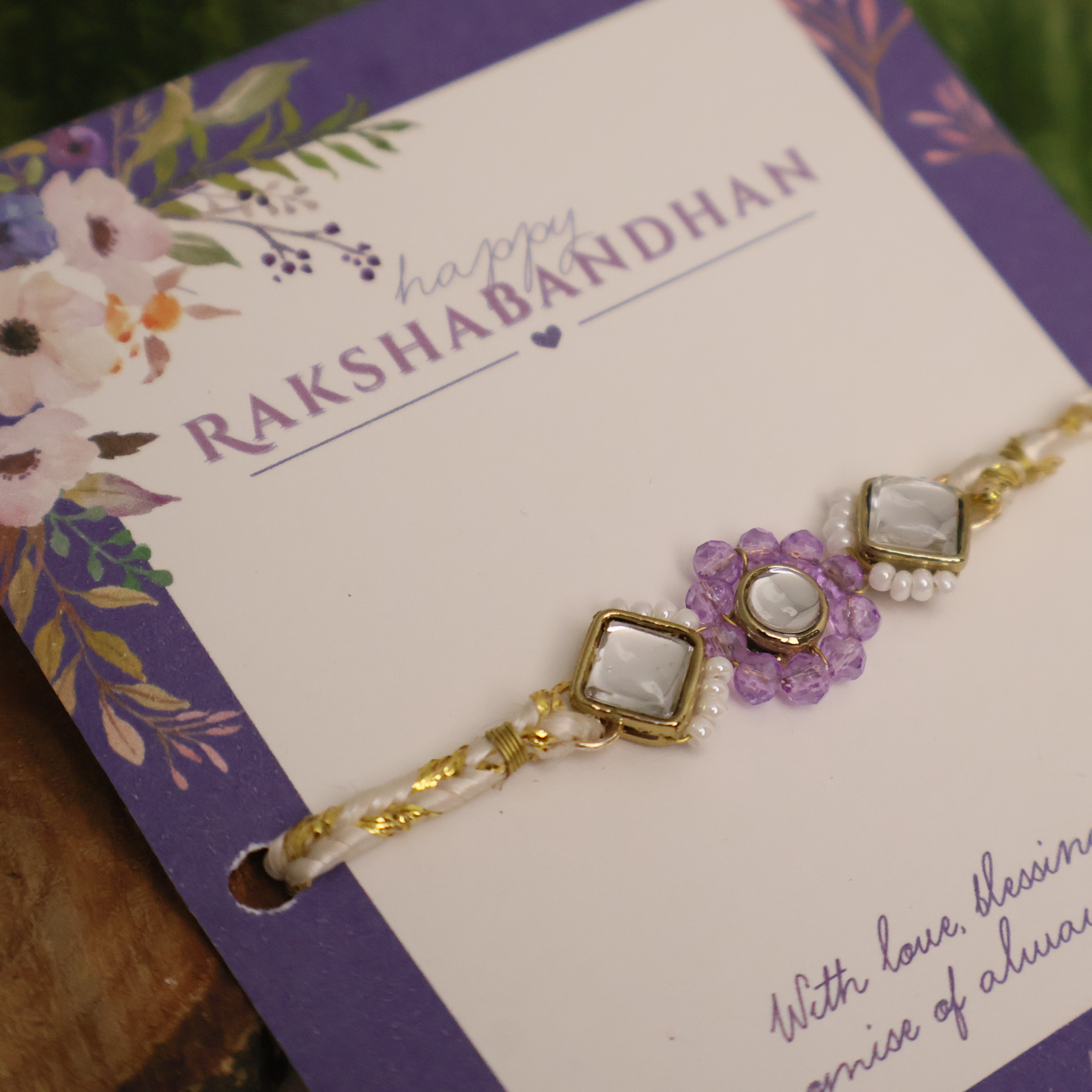 Purple Floral Pearl Stone Rakhi