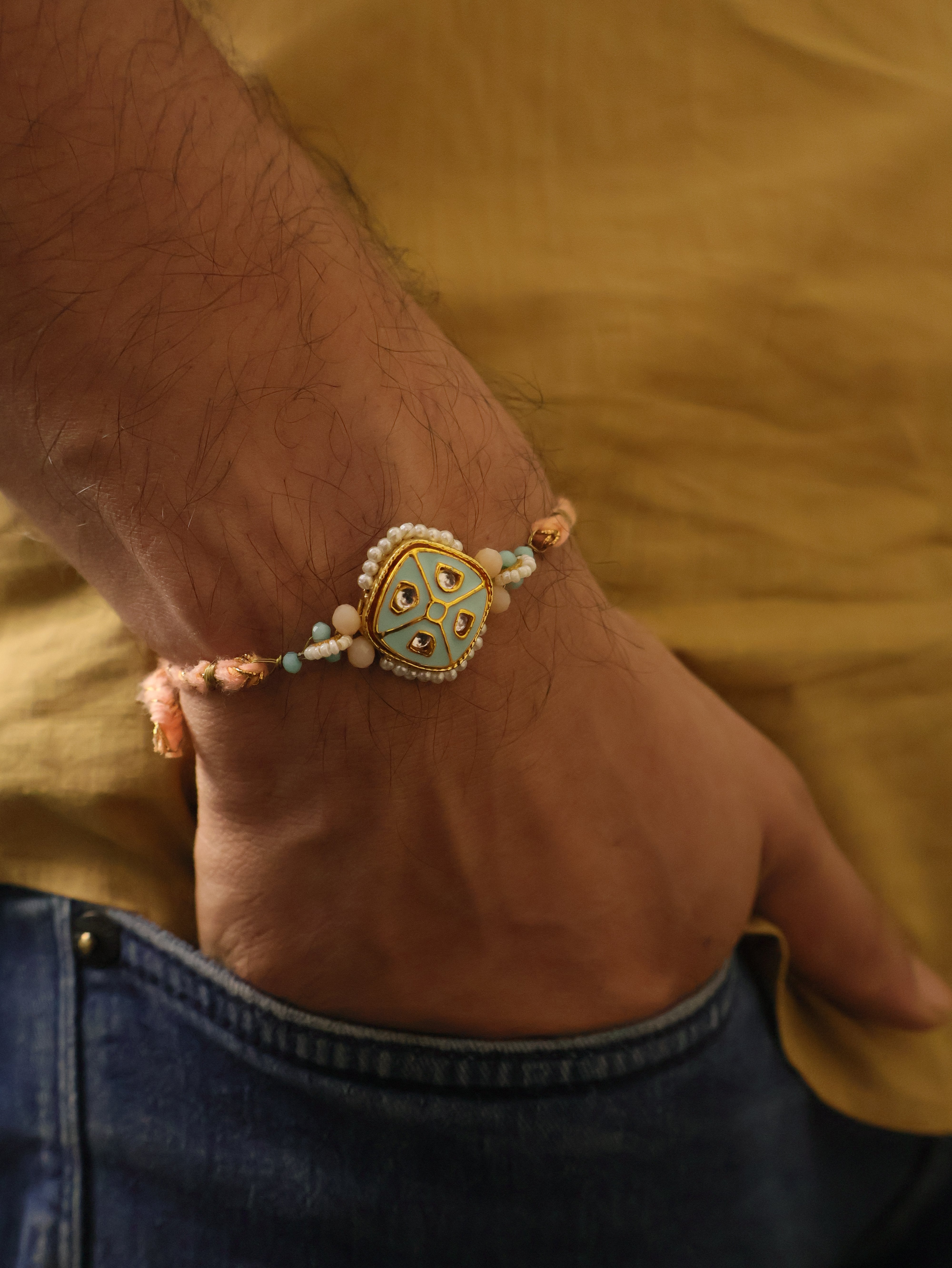 Pastel Kundan Pearl Charm Rakhi