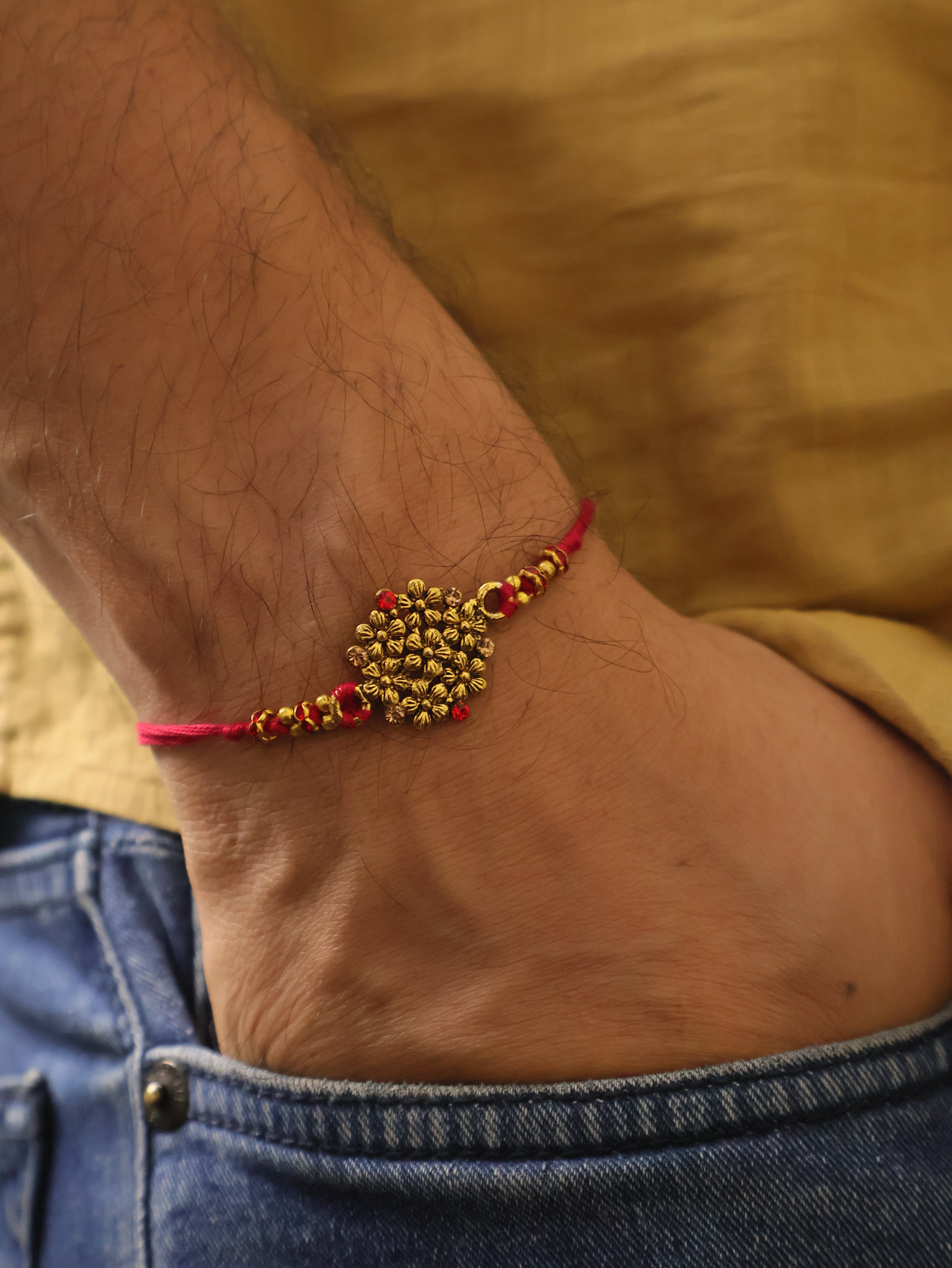 Golden Bead Cluster Traditional Rakhi