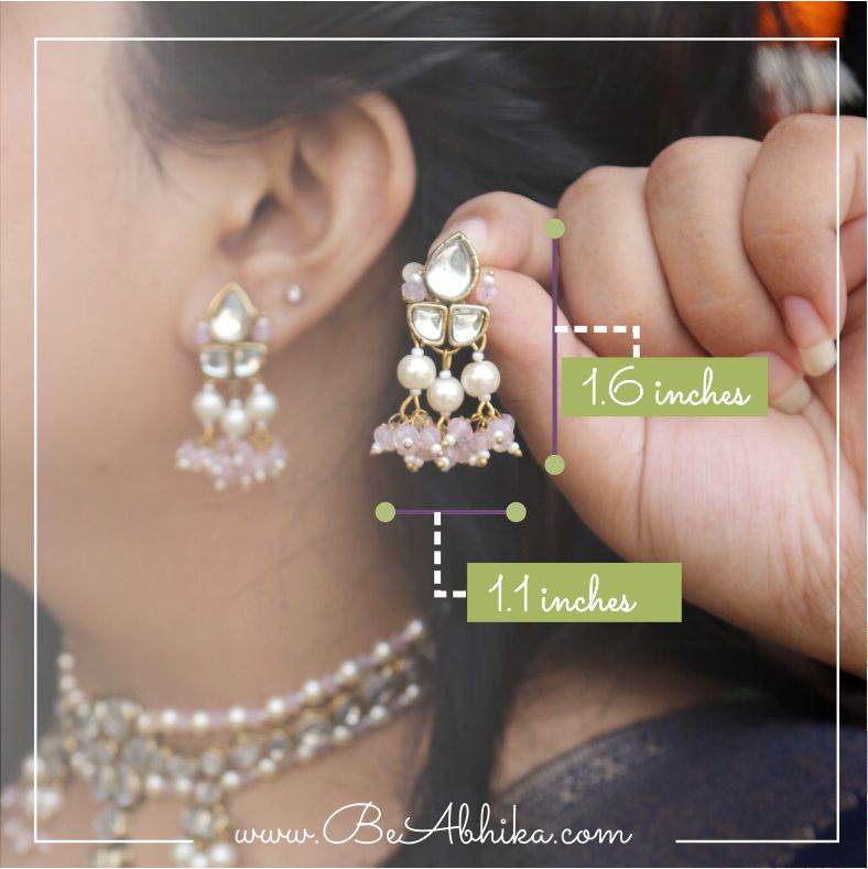 Traditional Kundan earrings in gold-tone, perfect for weddings and festive wear