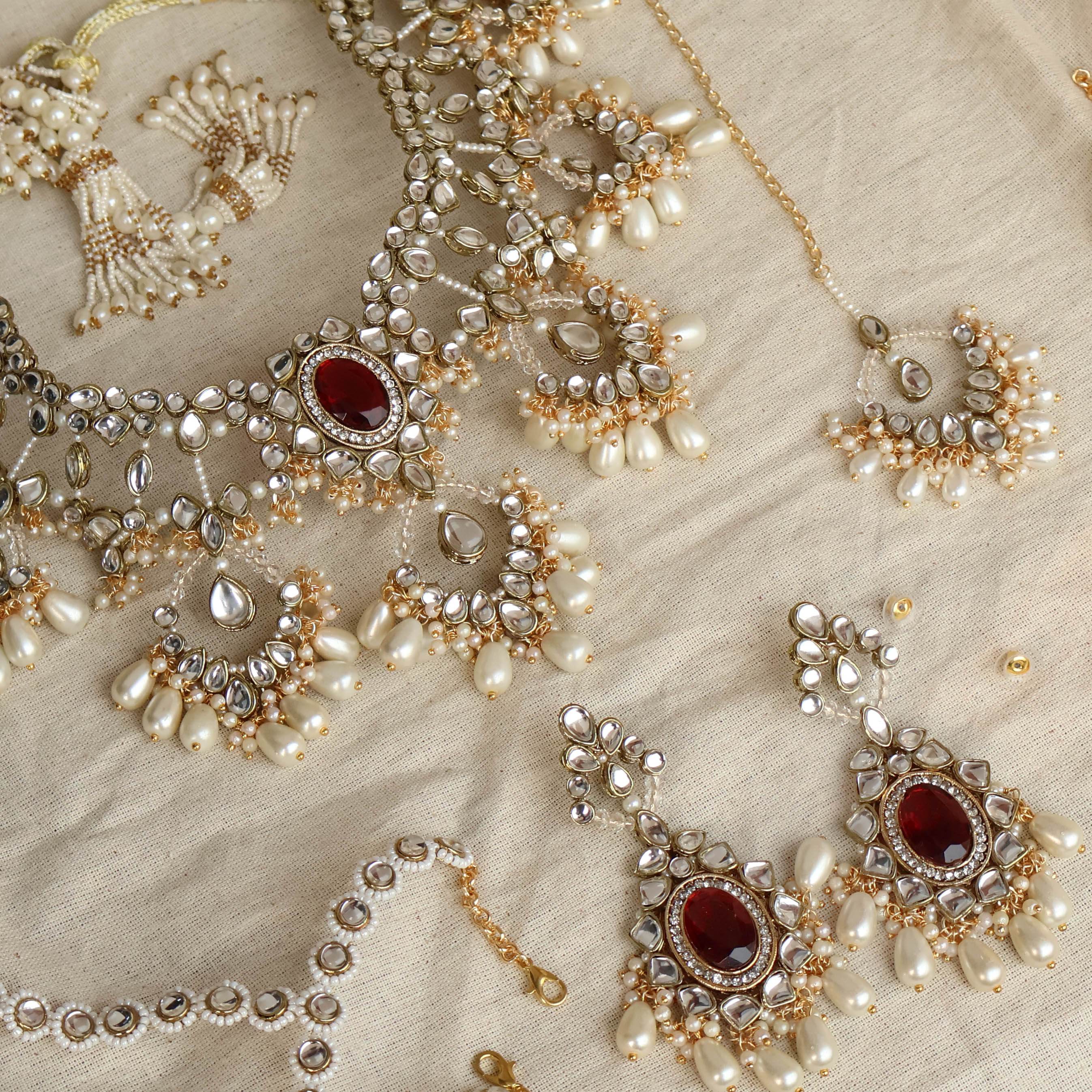Regal Bridal Jewelry Set: Necklace, Maangtikka, Earrings, Hathphool, Anklet & Maangtikka - BeAbhika.com