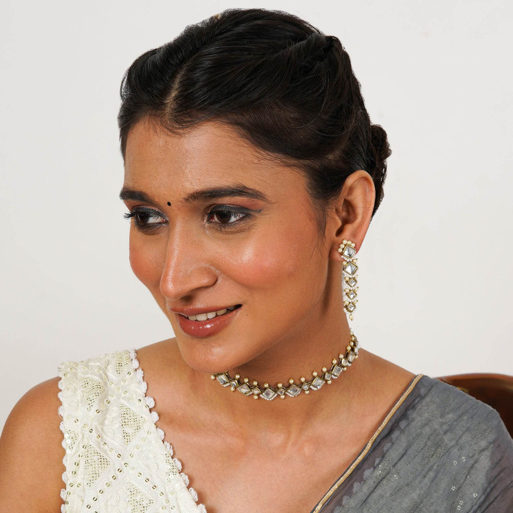 Kundan choker set in gold-tone with matching earrings and long bridal necklace, perfect for wedding functions , festive and bridal wear